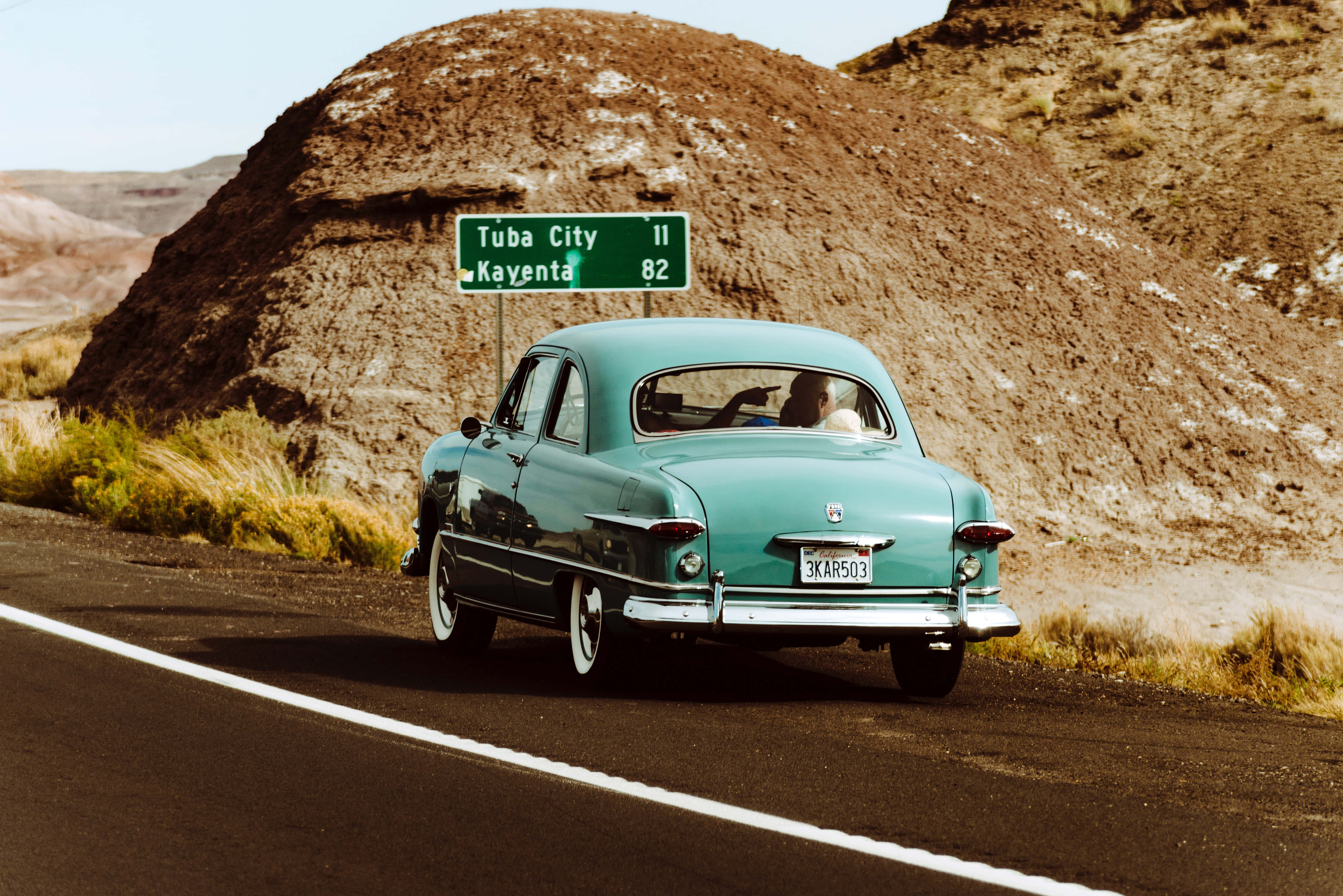 vintage teal car, desert highway, rocky hill, 5K Desktop Wallpaper