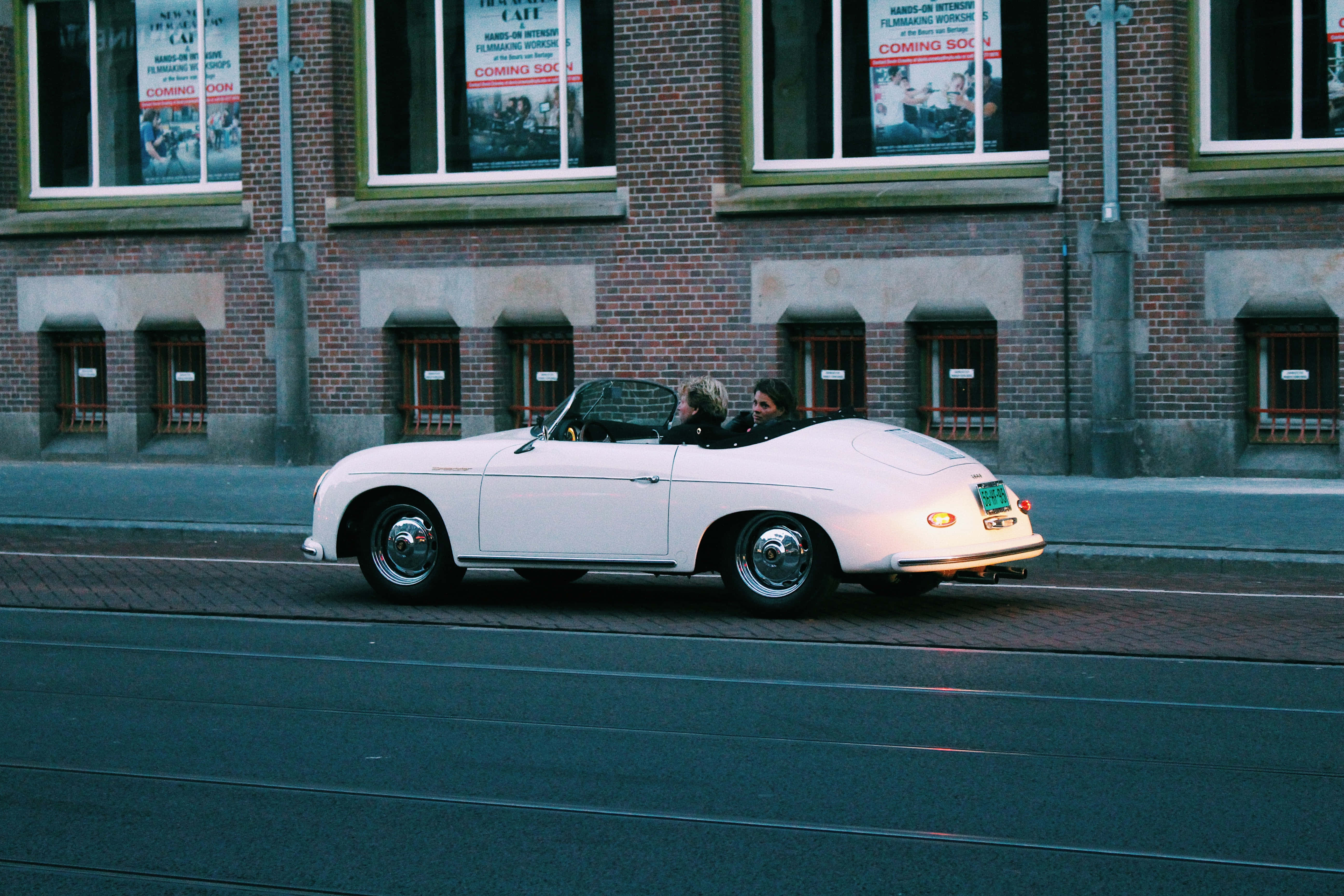 white vintage convertible, cobblestone street, brick building, 5K Desktop Wallpaper