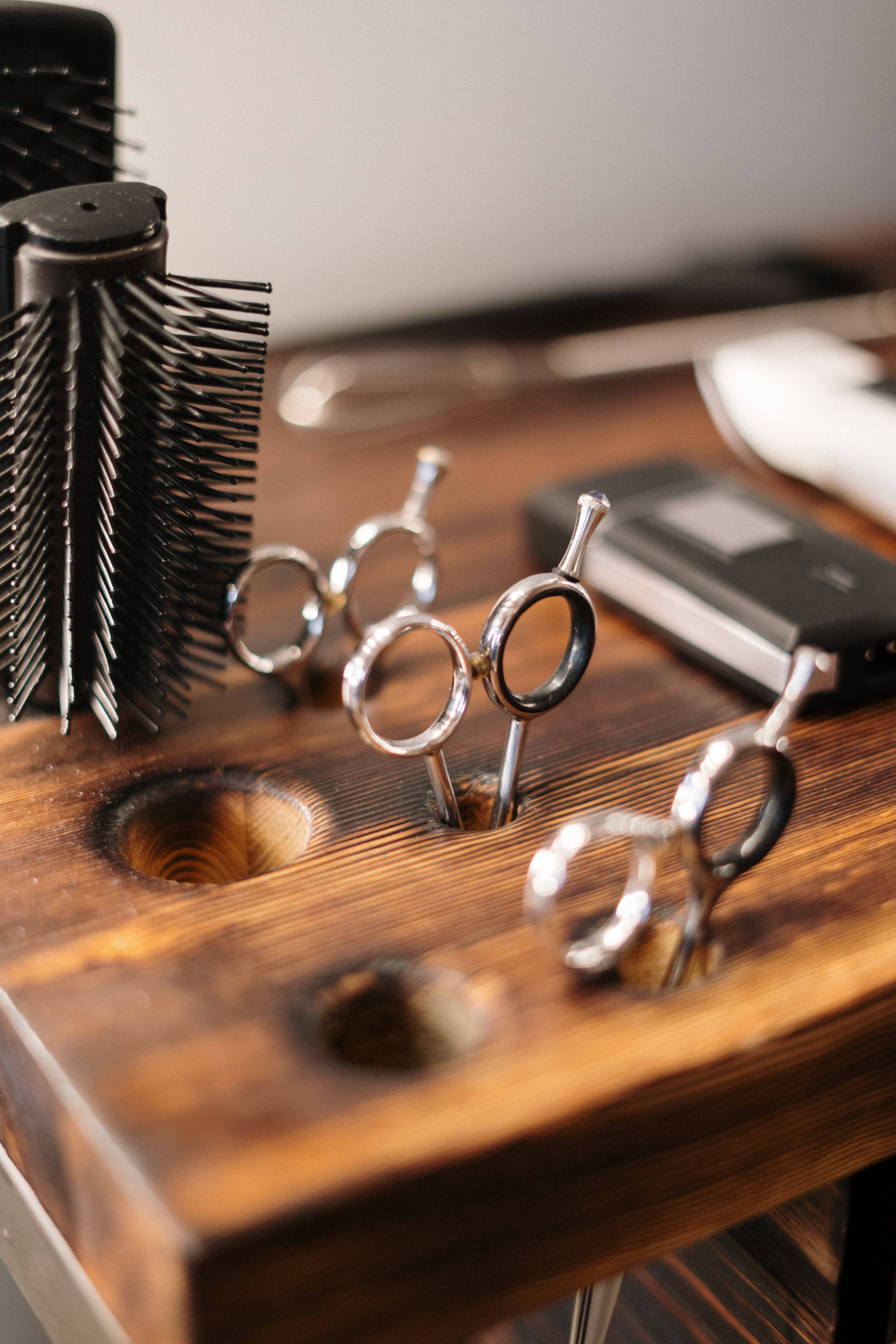 haircut scissors, black brushes, rustic wooden barber stand, 5K Phone Wallpaper
