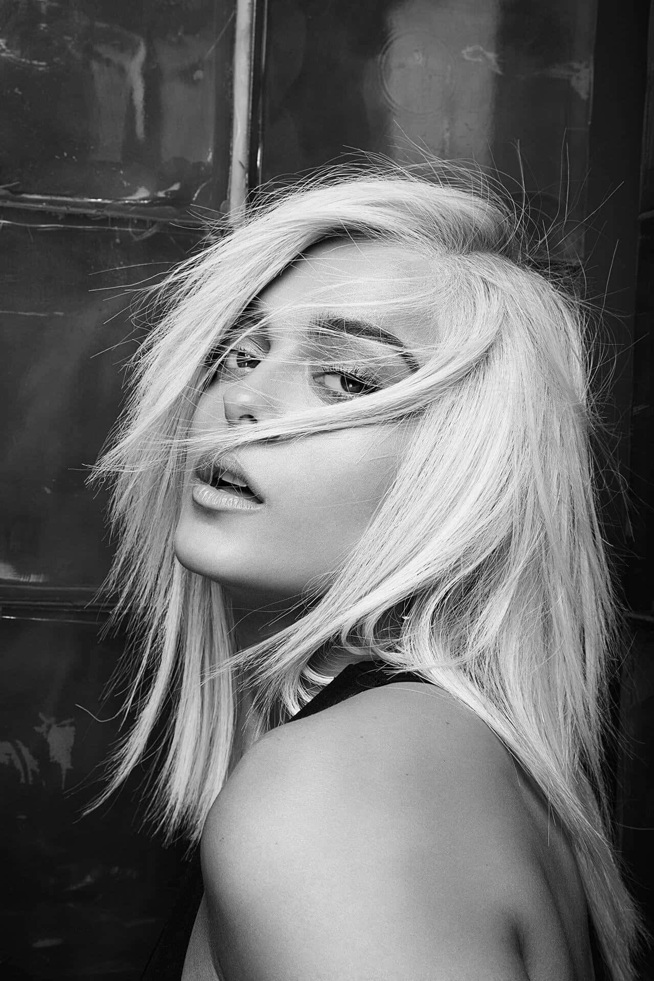 Bebe Rexha, black and white portrait, wind-swept blonde hair, Full HD Phone Wallpaper