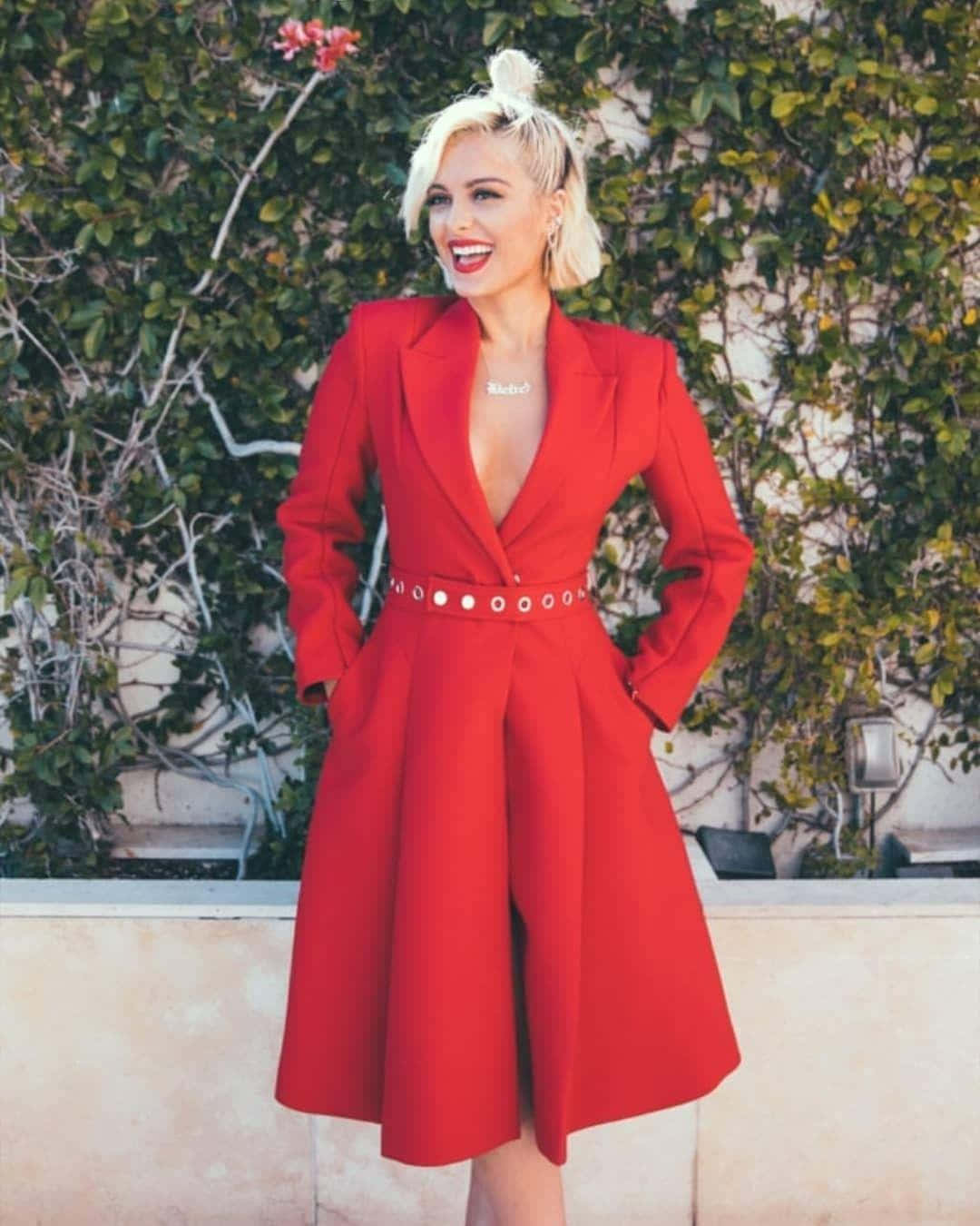Bebe Rexha, bold red coat, studded belt, HD Phone Wallpaper