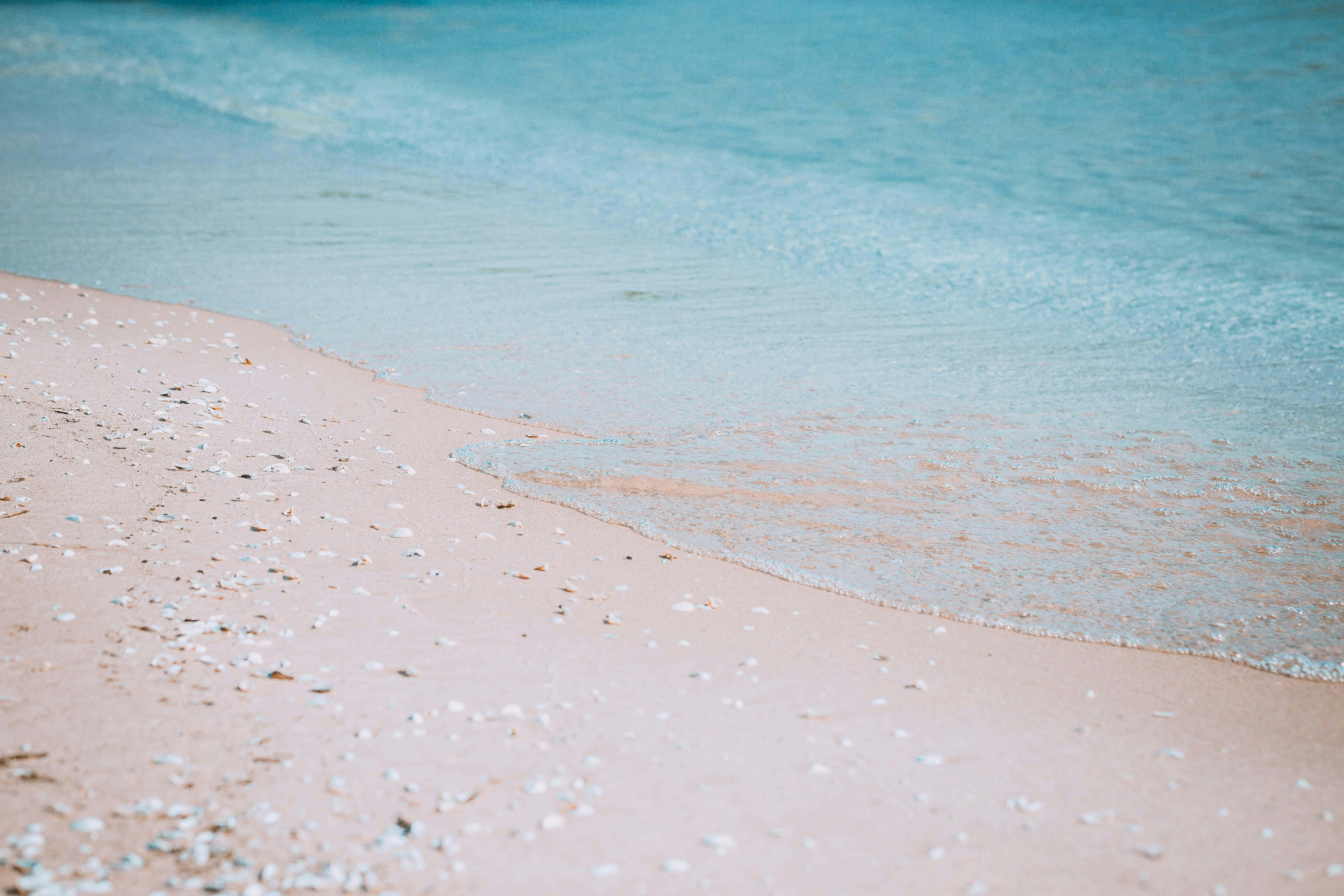 Beige Beach Waves Gentle Shoreline, soft pink sand, gentle turquoise waves, 5K Desktop Wallpaper