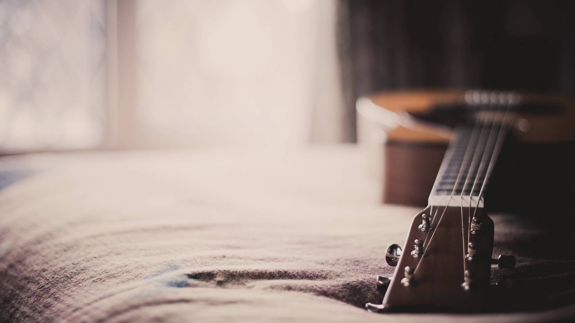 acoustic guitar, textured blanket, softly lit window, Full HD Desktop Wallpaper