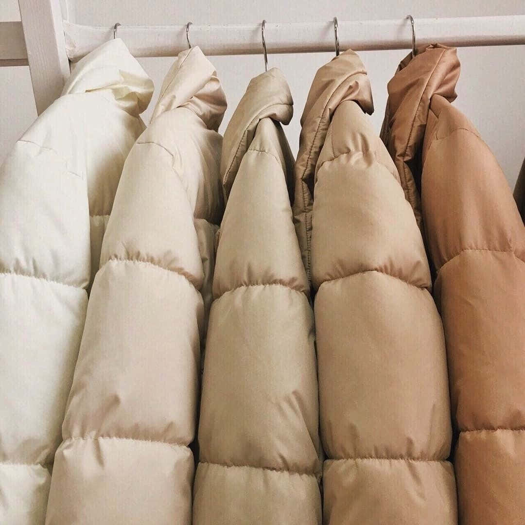 beige cream puffer coat, hangers, white rod, SD Desktop Wallpaper