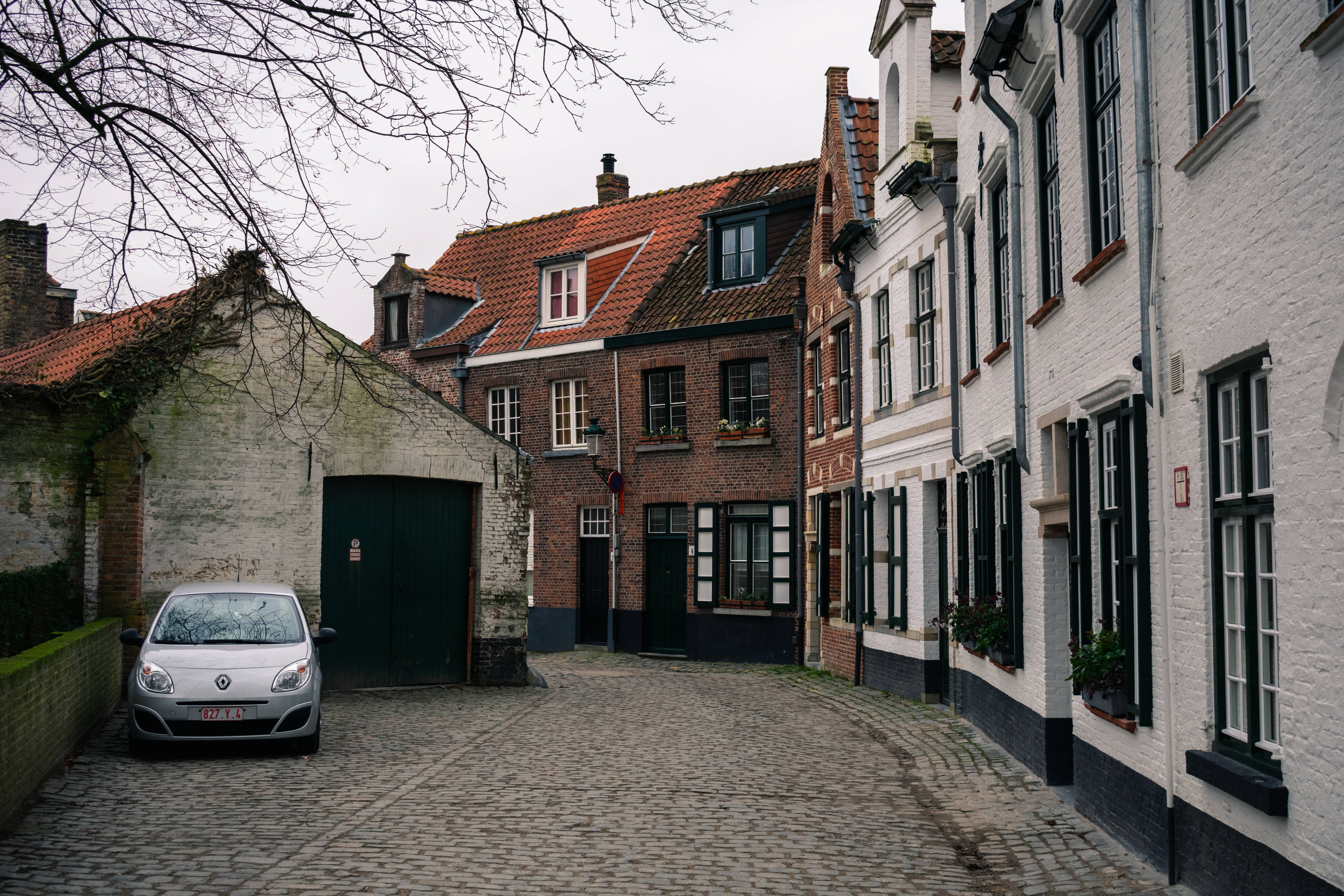 Belgium, cobblestone alleyway, historic brick buildings, 5K Desktop Wallpaper