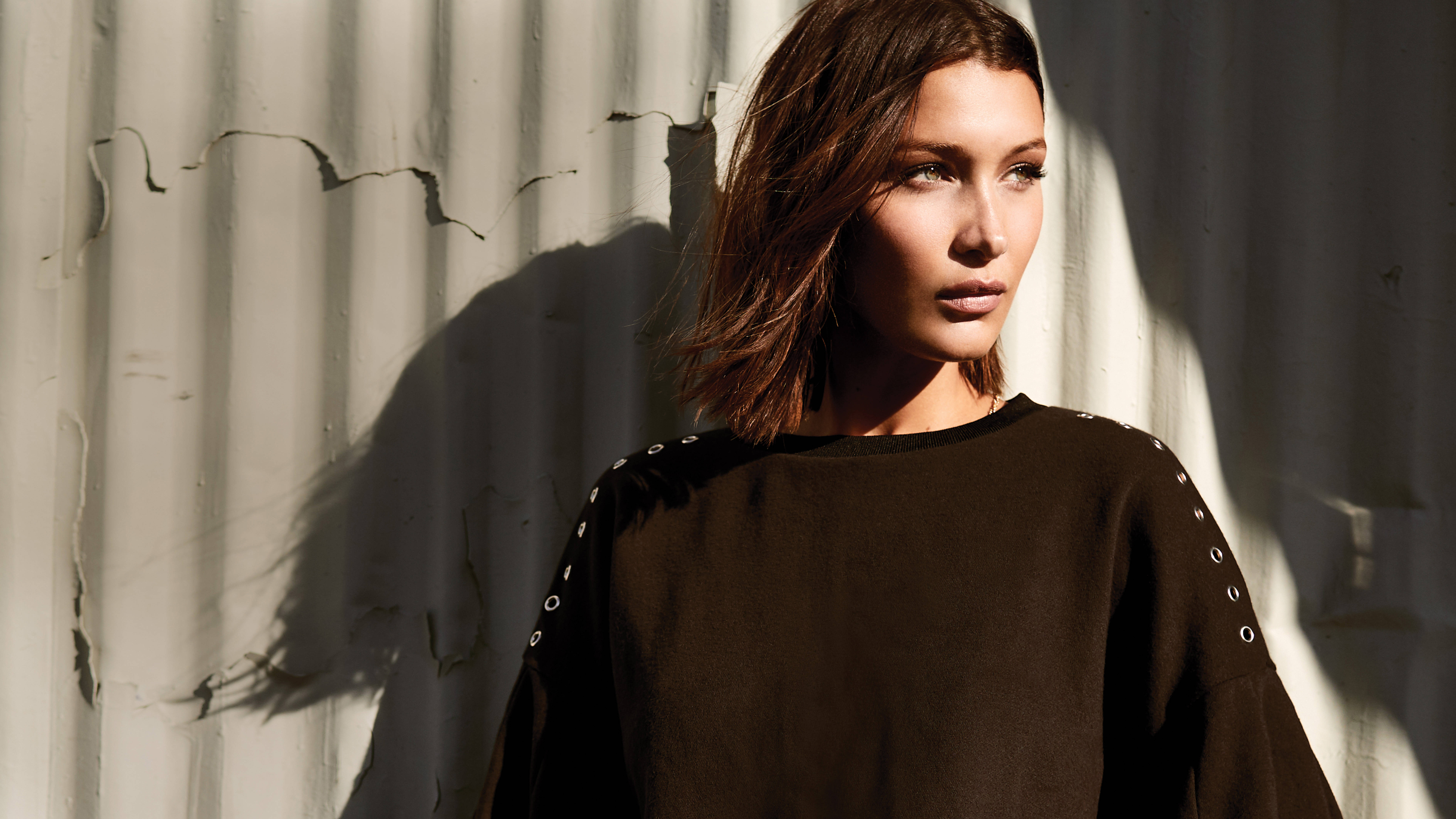 Bella Hadid, shoulder-length brown hair, dramatic sunlight, 8K Desktop Wallpaper