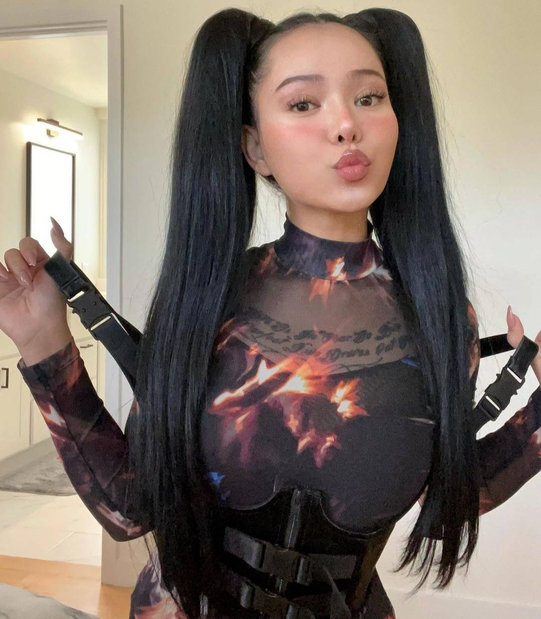 Bella Poarch, long black pigtails, fiery patterned outfit, SD Phone Wallpaper