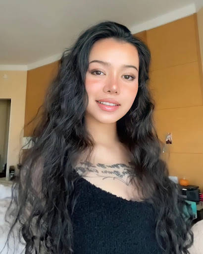Bella Poarch, long dark wavy hair, chest tattoo, SD Phone Wallpaper
