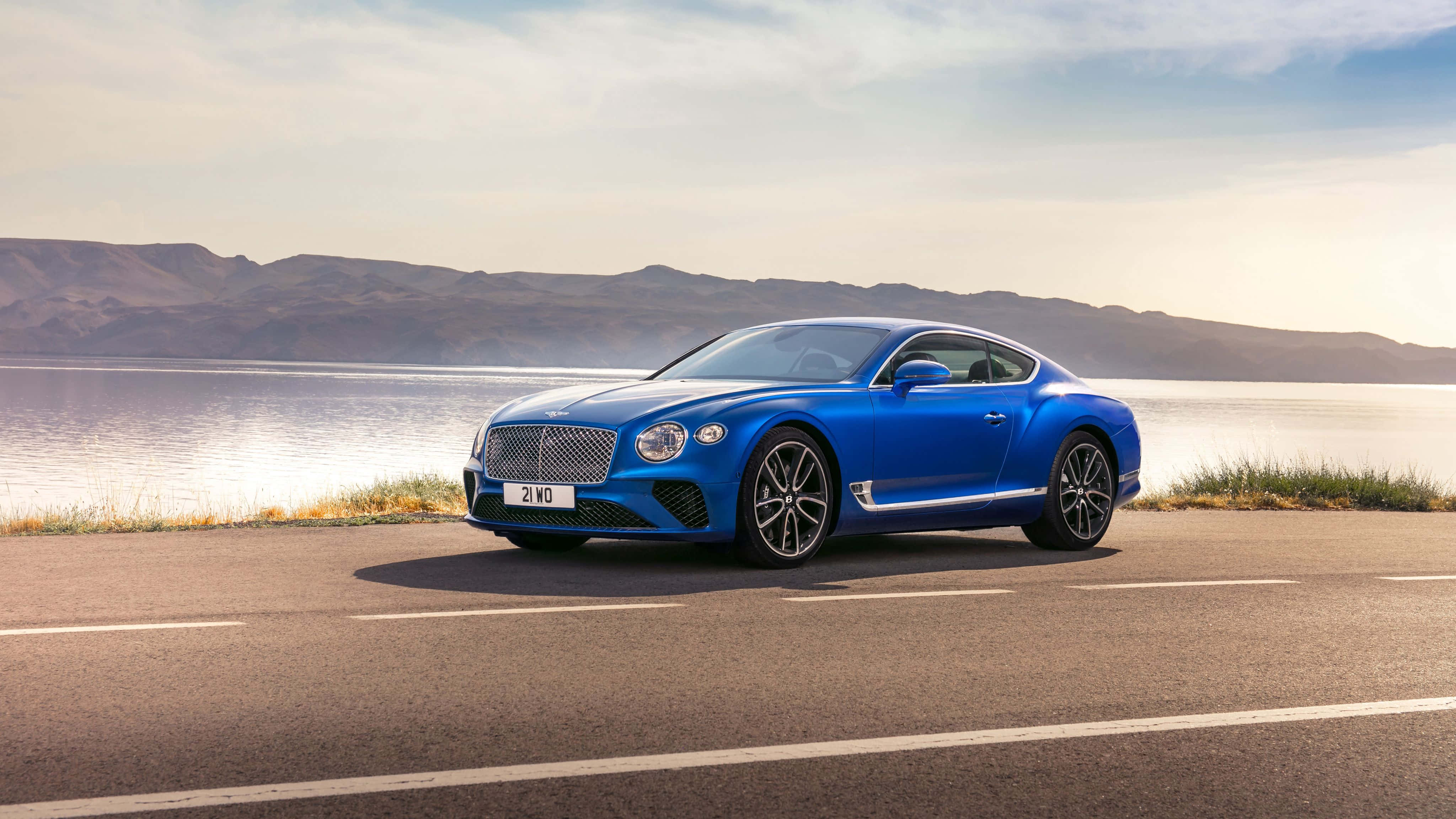 Bentley Continental GT, coastal road, mountains, 4K Desktop Wallpaper