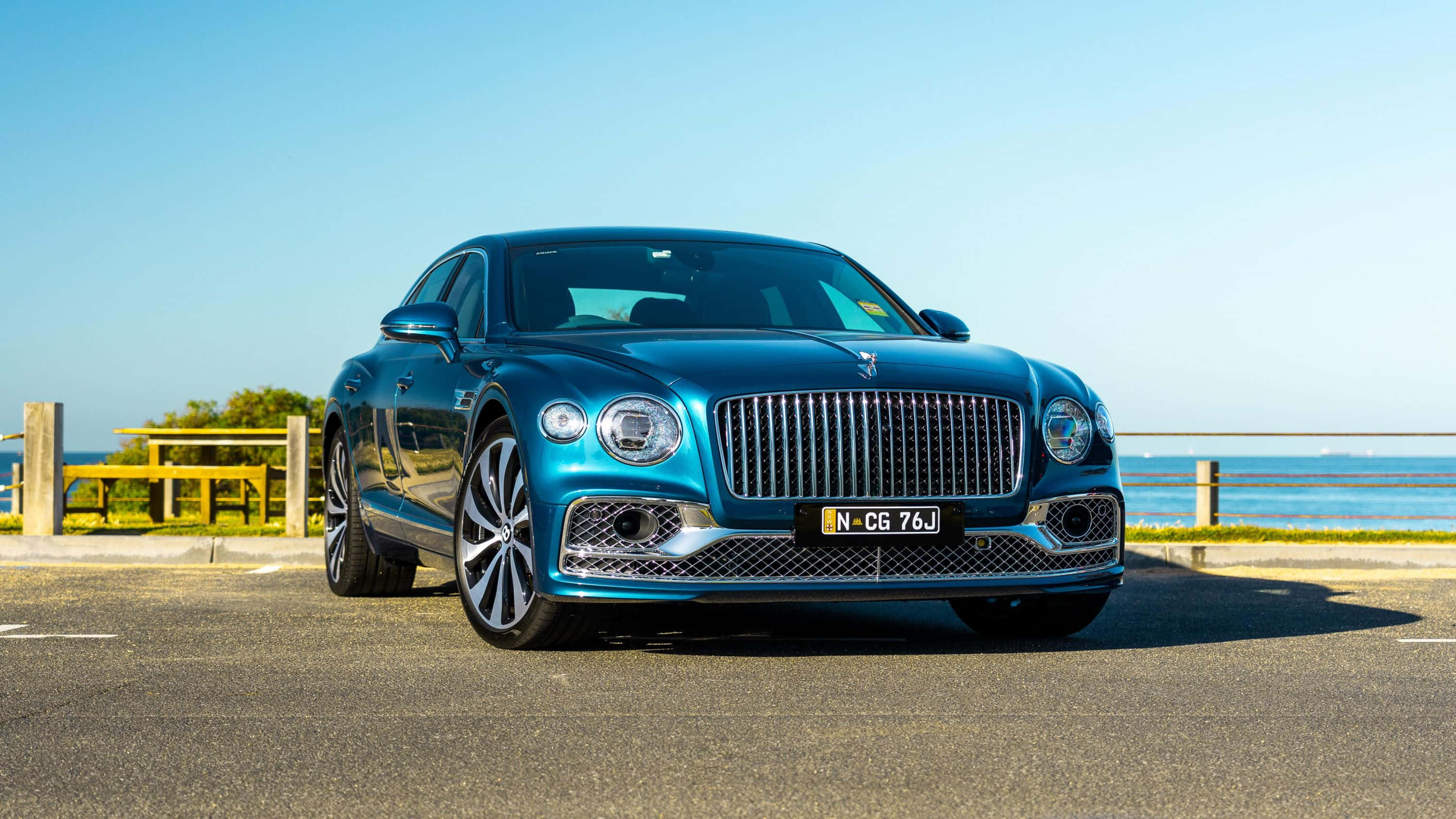 Bentley Flying Spur, blue, coastal road, 2K Desktop Wallpaper