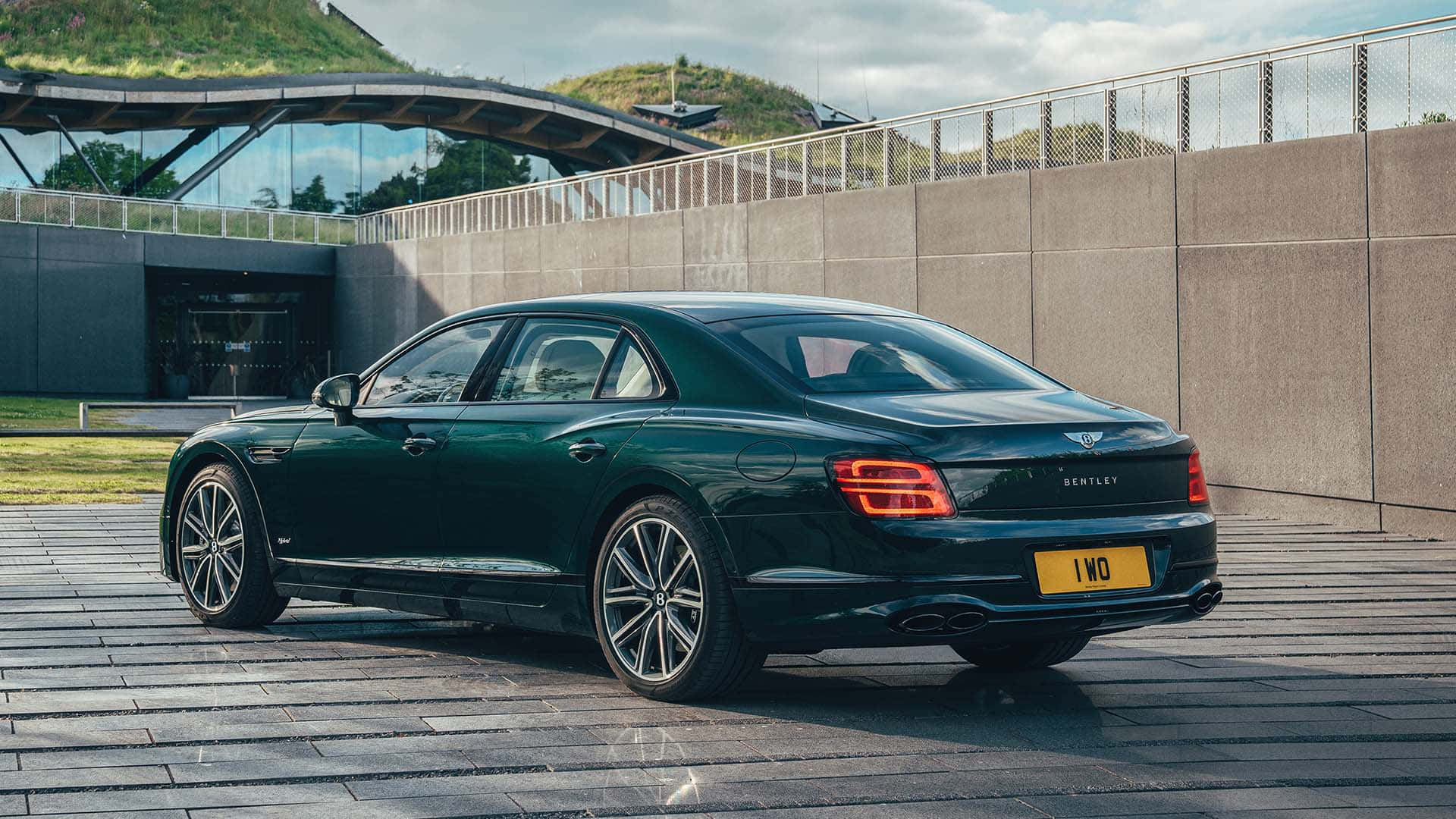 Bentley Flying Spur, dark green, stone plaza, Full HD Desktop Wallpaper