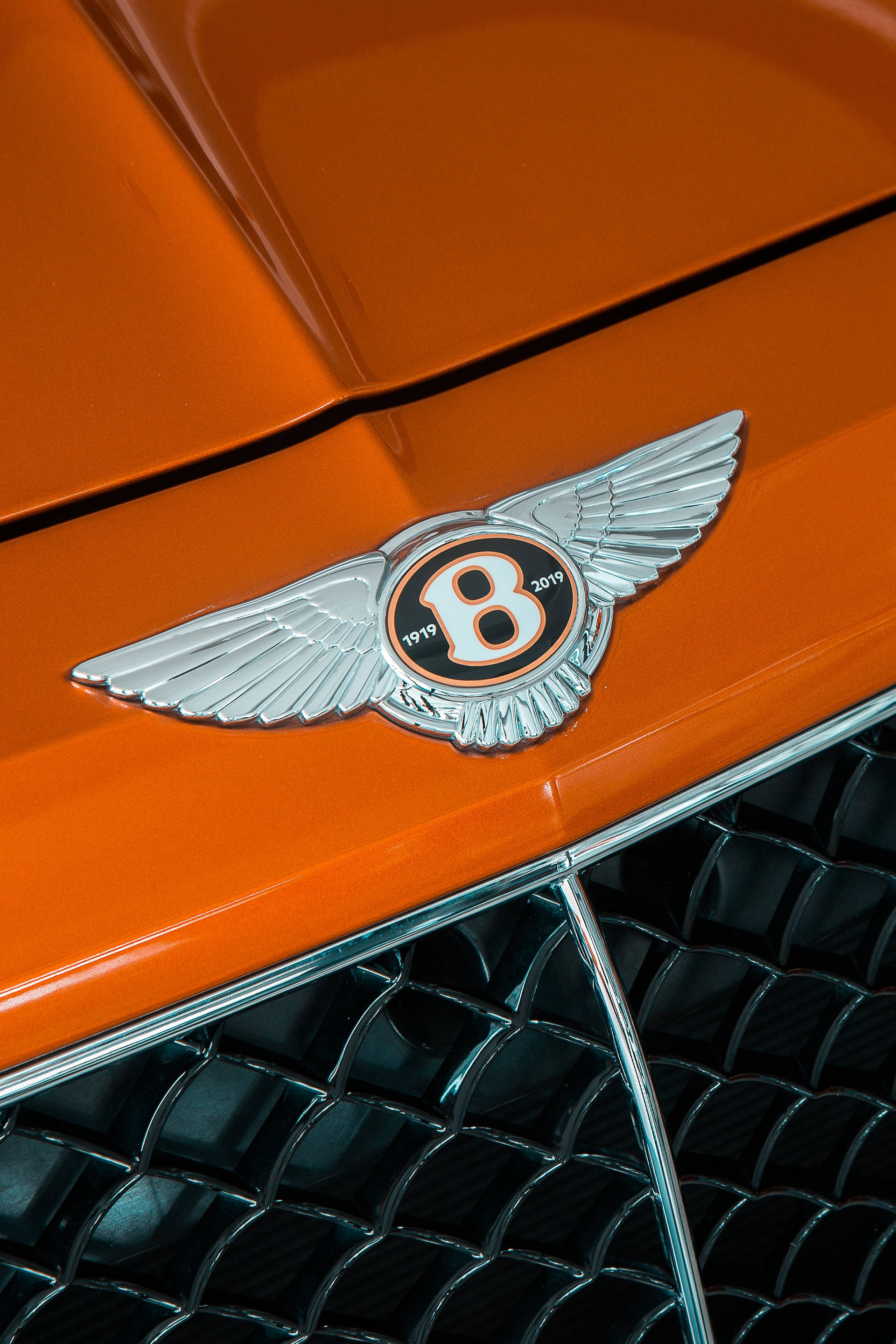 Bentley, orange hood ornament, silver wings, 2K Phone Wallpaper