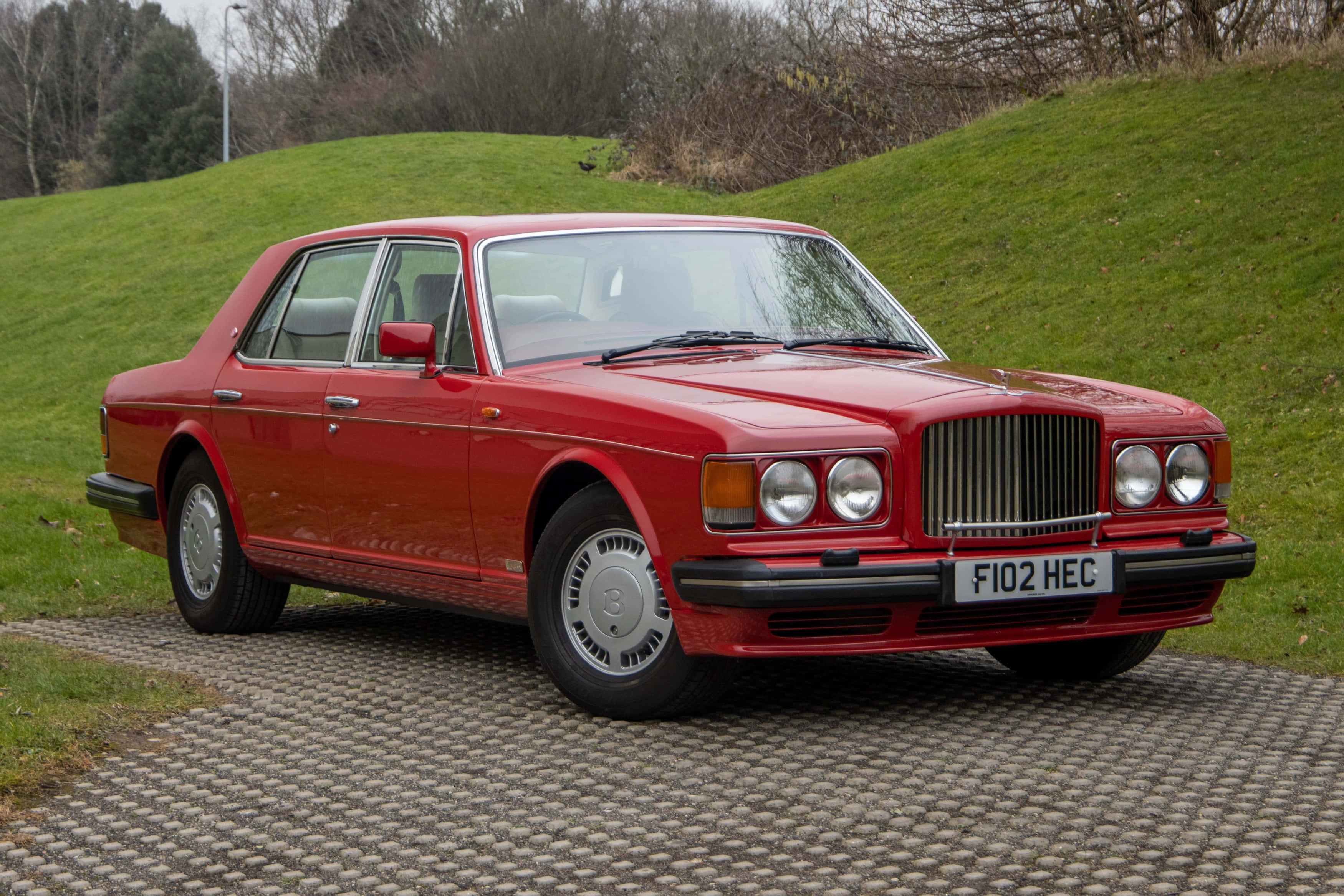 Red Bentley Turbo R, glossy red, textured stone driveway, 2K Desktop Wallpaper