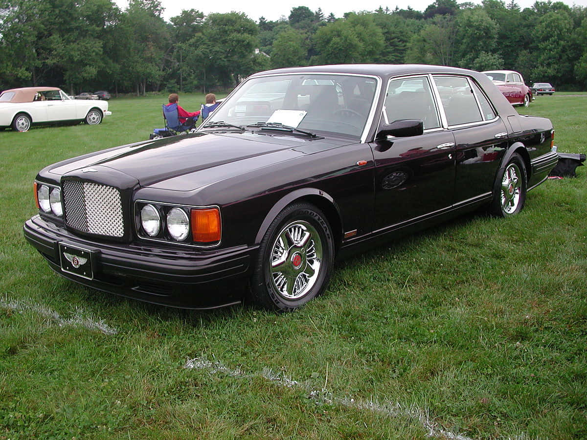 Bentley Turbo R, glossy black, chrome wheels, SD Desktop Wallpaper