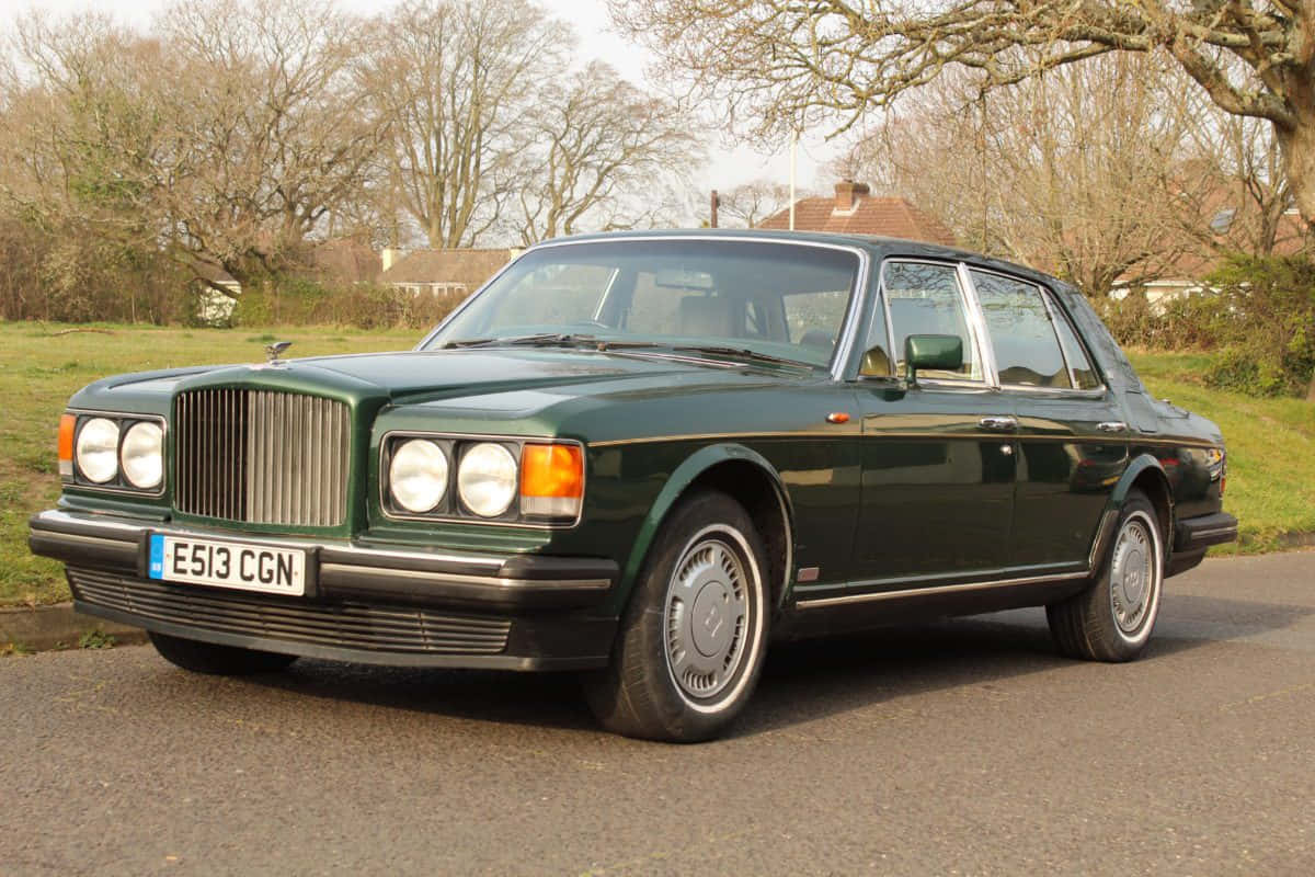 Bentley Turbo R, dark green, paved road, SD Desktop Wallpaper