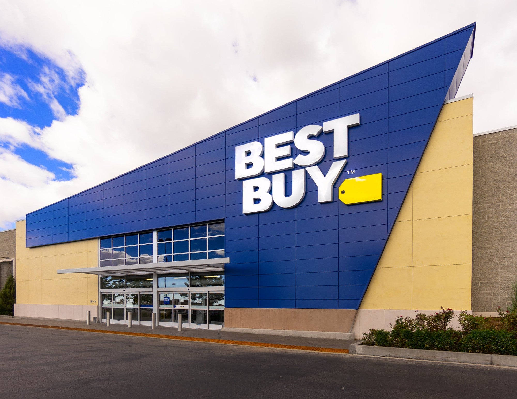Best Buy, bold blue and yellow signage, partly cloudy sky, Full HD Desktop Wallpaper