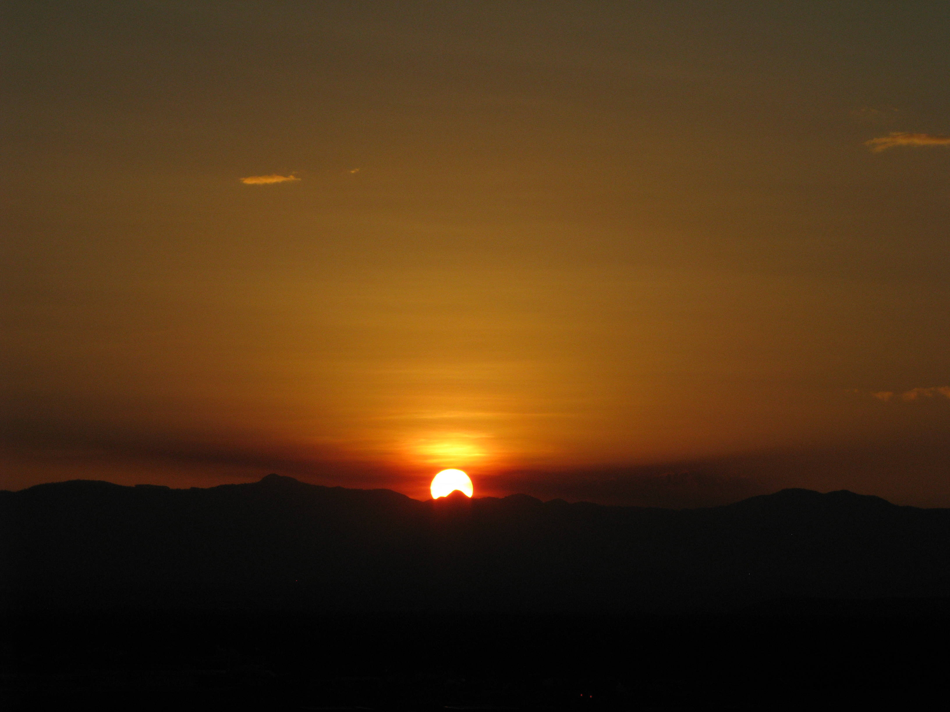 sunset, orange sun, dark mountain silhouettes, 2K Desktop Wallpaper