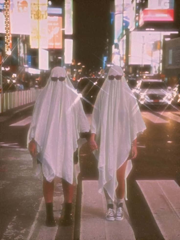 white ghost costumes, sunglasses, neon-lit city street, SD Phone Wallpaper