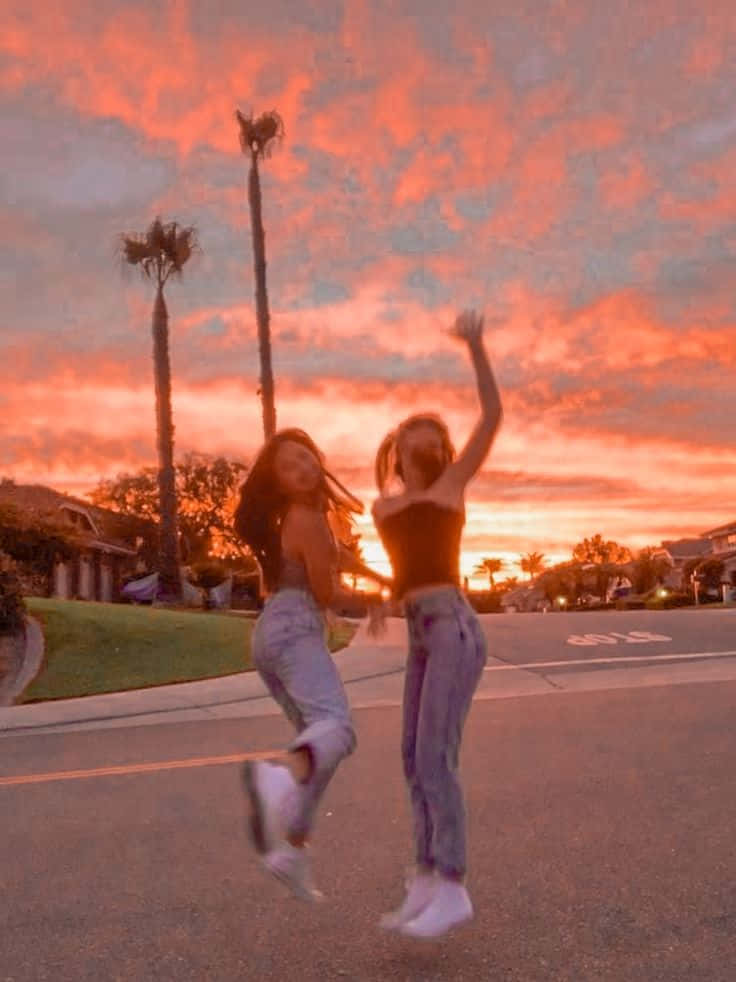 best friend aesthetic, suburban street, fiery orange and pink sunset sky, SD Phone Wallpaper