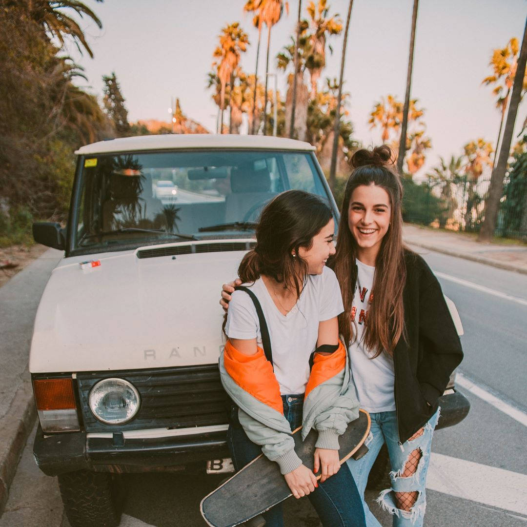 skateboarding best friends, white vintage Range Rover, palm-lined street, SD Desktop Wallpaper