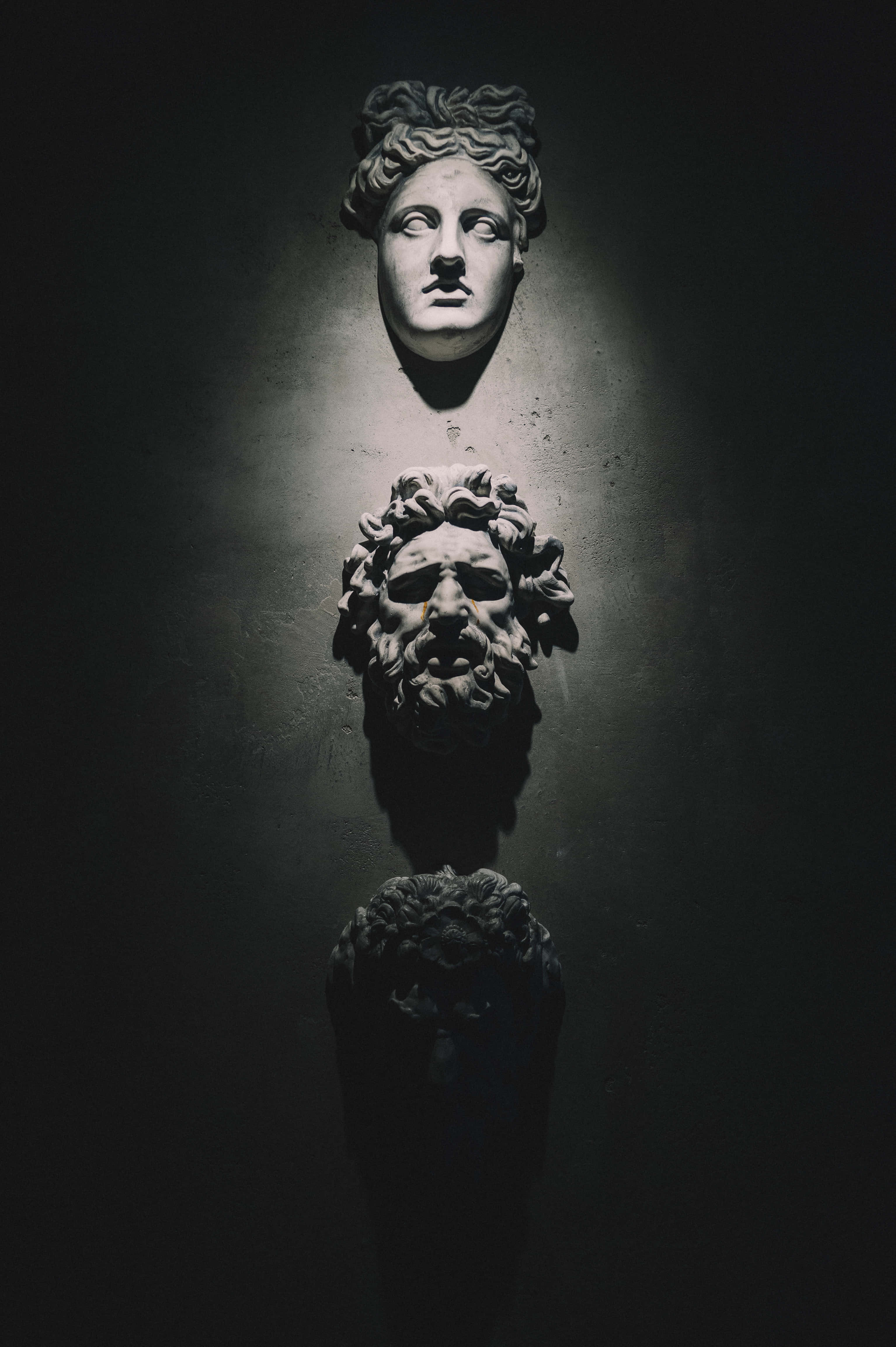Greek Mythology, stone busts, dimly lit room, 4K Phone Wallpaper