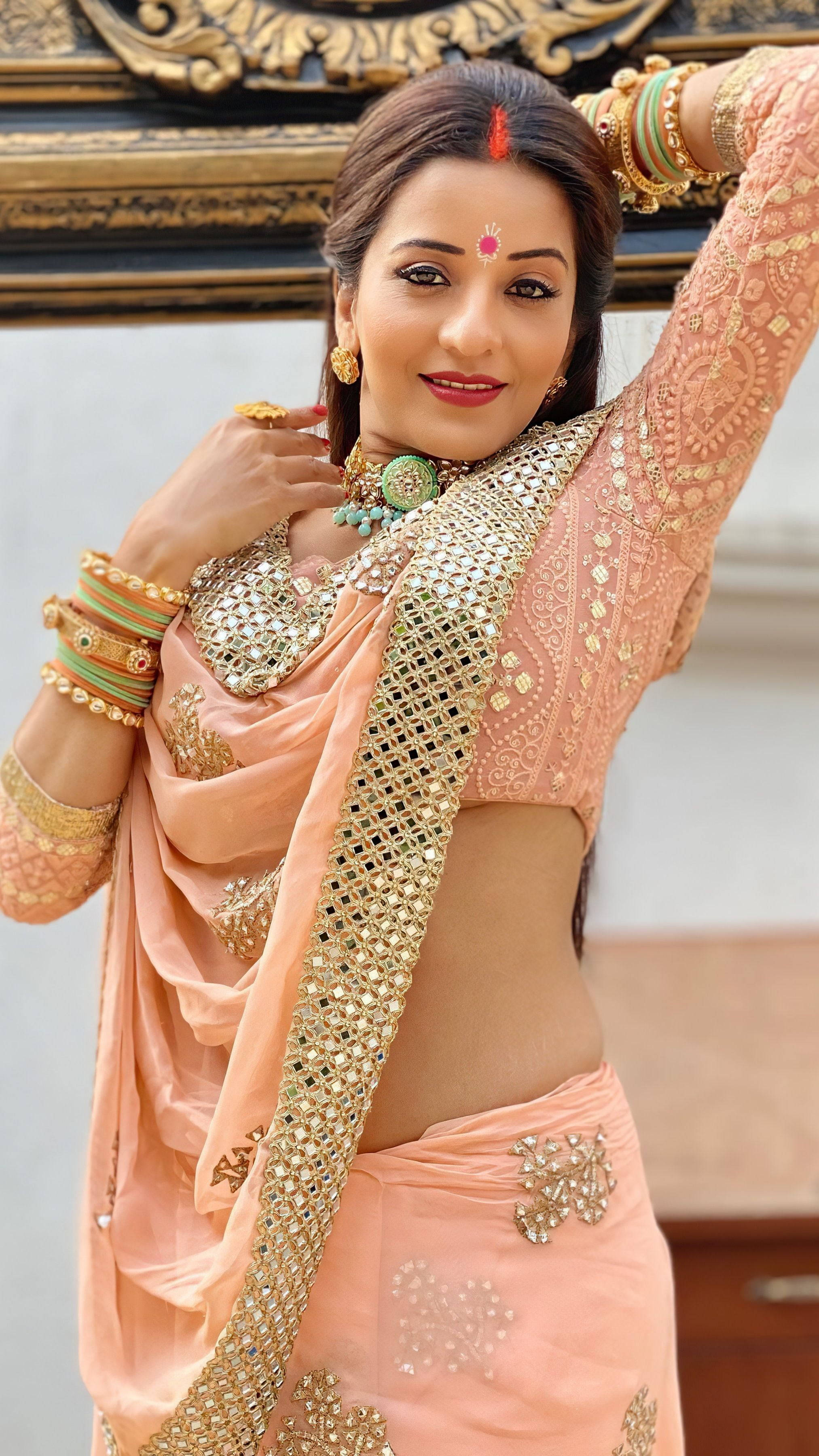 Bhojpuri actress, peach dress, ornate peach and gold traditional attire, 2K Phone Wallpaper
