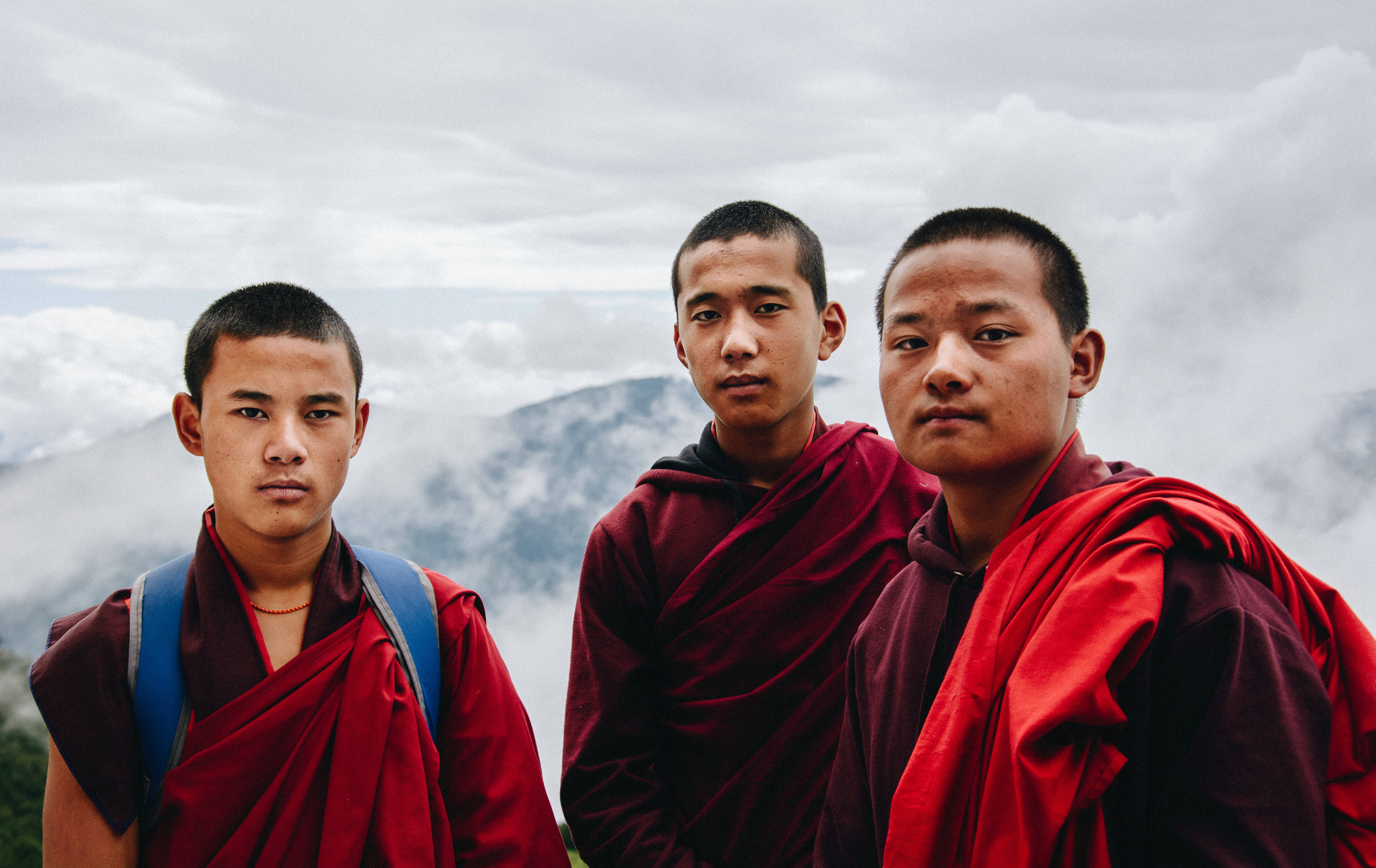 Bhutan, Buddhist monks, vibrant red robes, 5K Desktop Wallpaper
