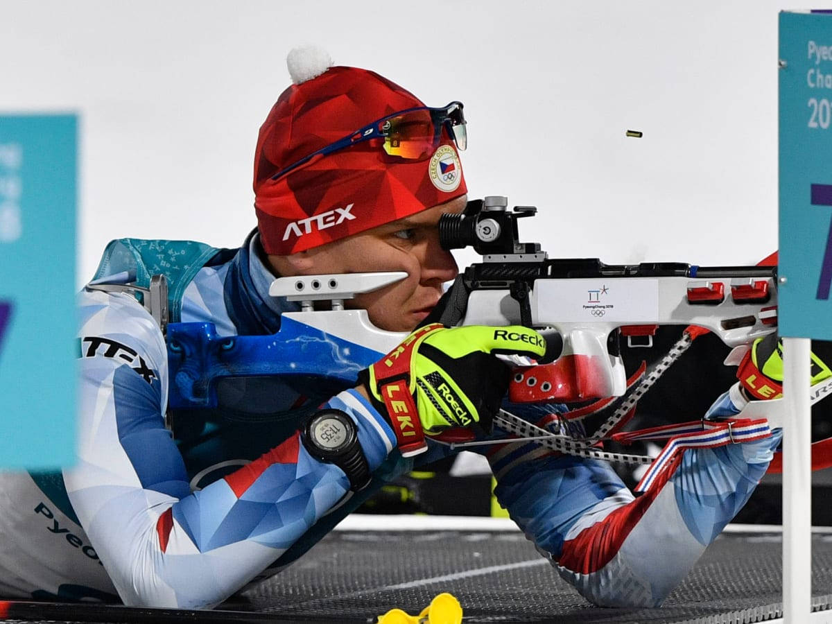 Biathlon, red hat, blue gear, SD Desktop Wallpaper