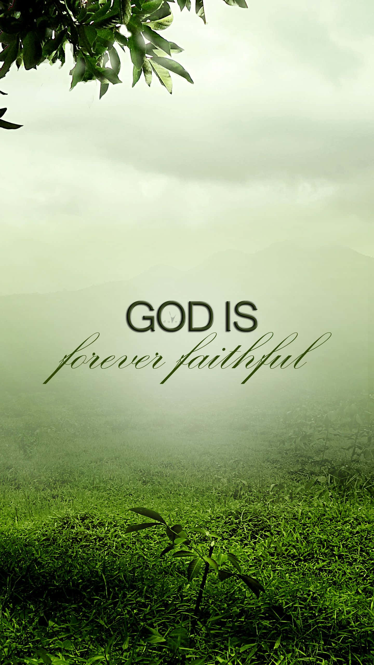 misty green field, overcast sky, bold text declaring god is forever faithful, 2K Phone Wallpaper