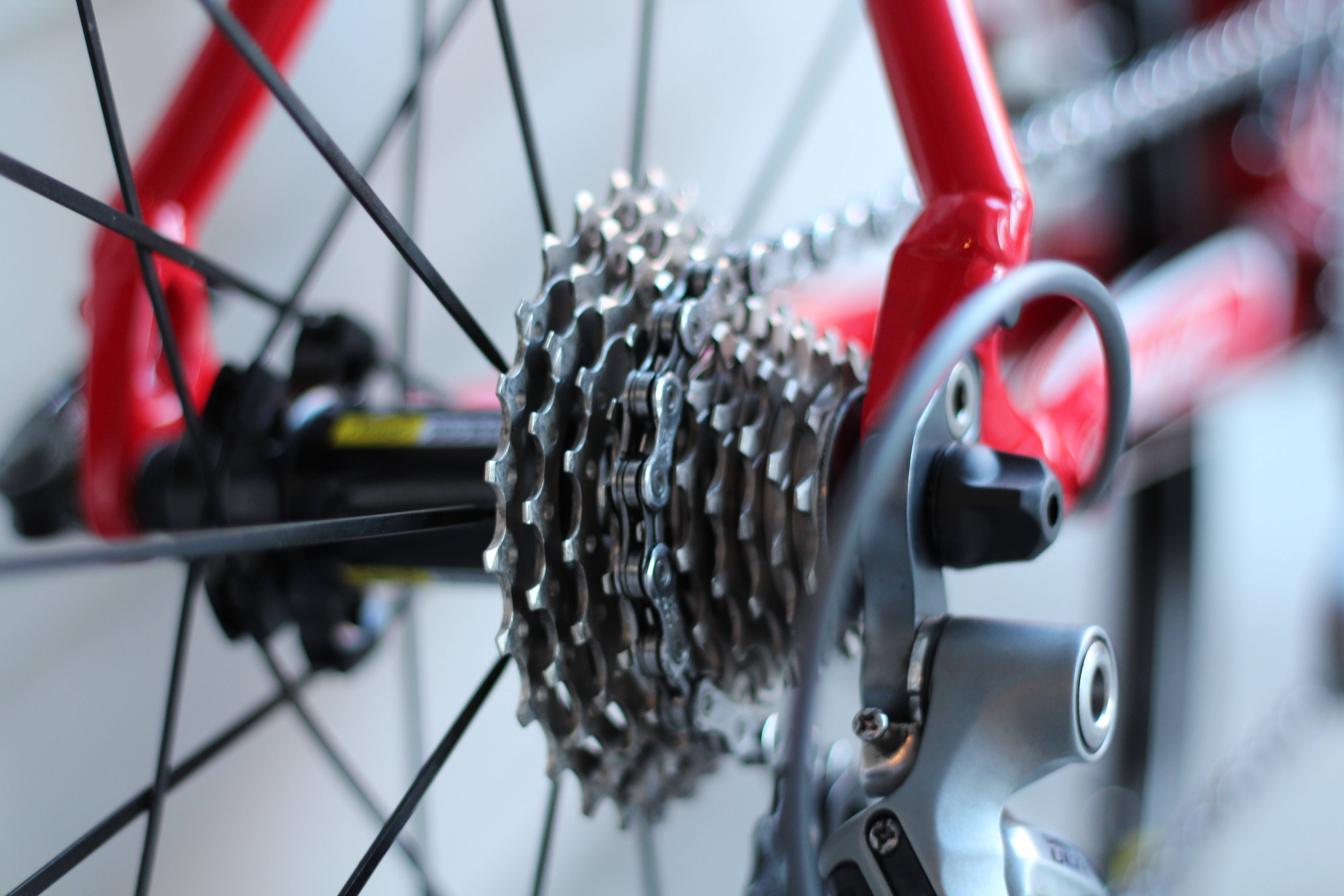 red bicycle, silver gear cassette, derailleur, 5K Desktop Wallpaper