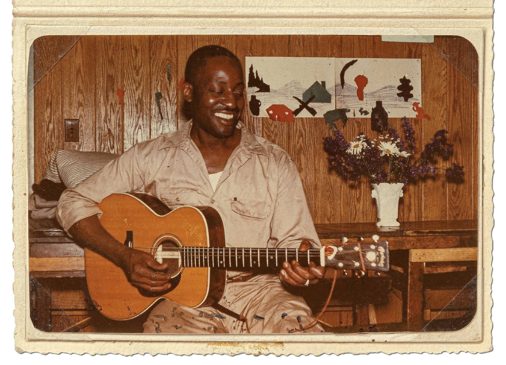 Big Bill Broonzy, acoustic guitar, wood-paneled room, Full HD Desktop Wallpaper