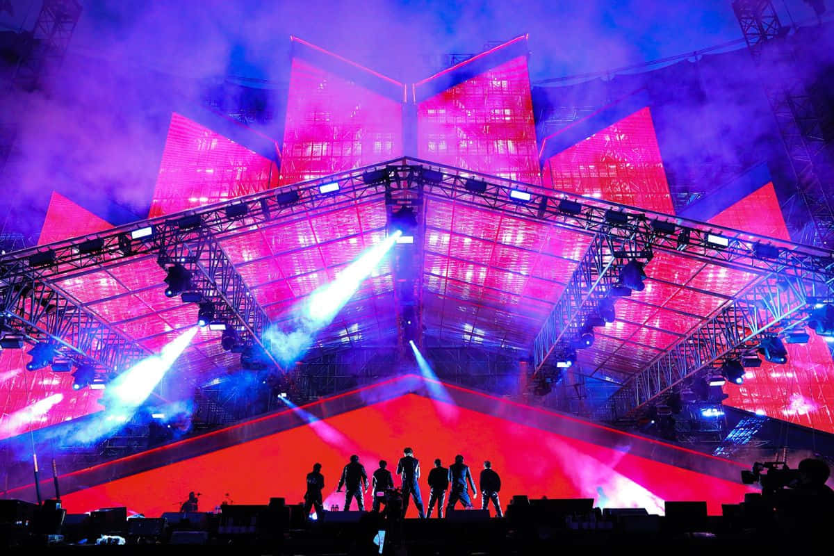 Big Hit Entertainment, massive stage, vibrant pink and blue lights, SD Desktop Wallpaper