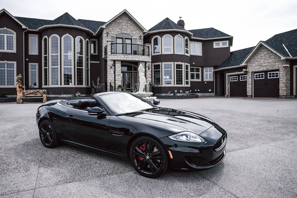 Big House, sleek black convertible sports car, dark brown mansion, SD Desktop Wallpaper