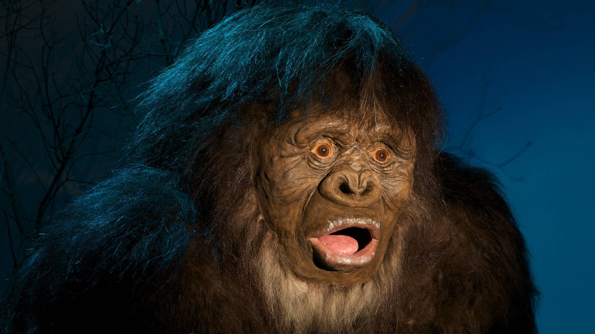 Bigfoot, glowing orange eyes, open mouth, Full HD Desktop Wallpaper