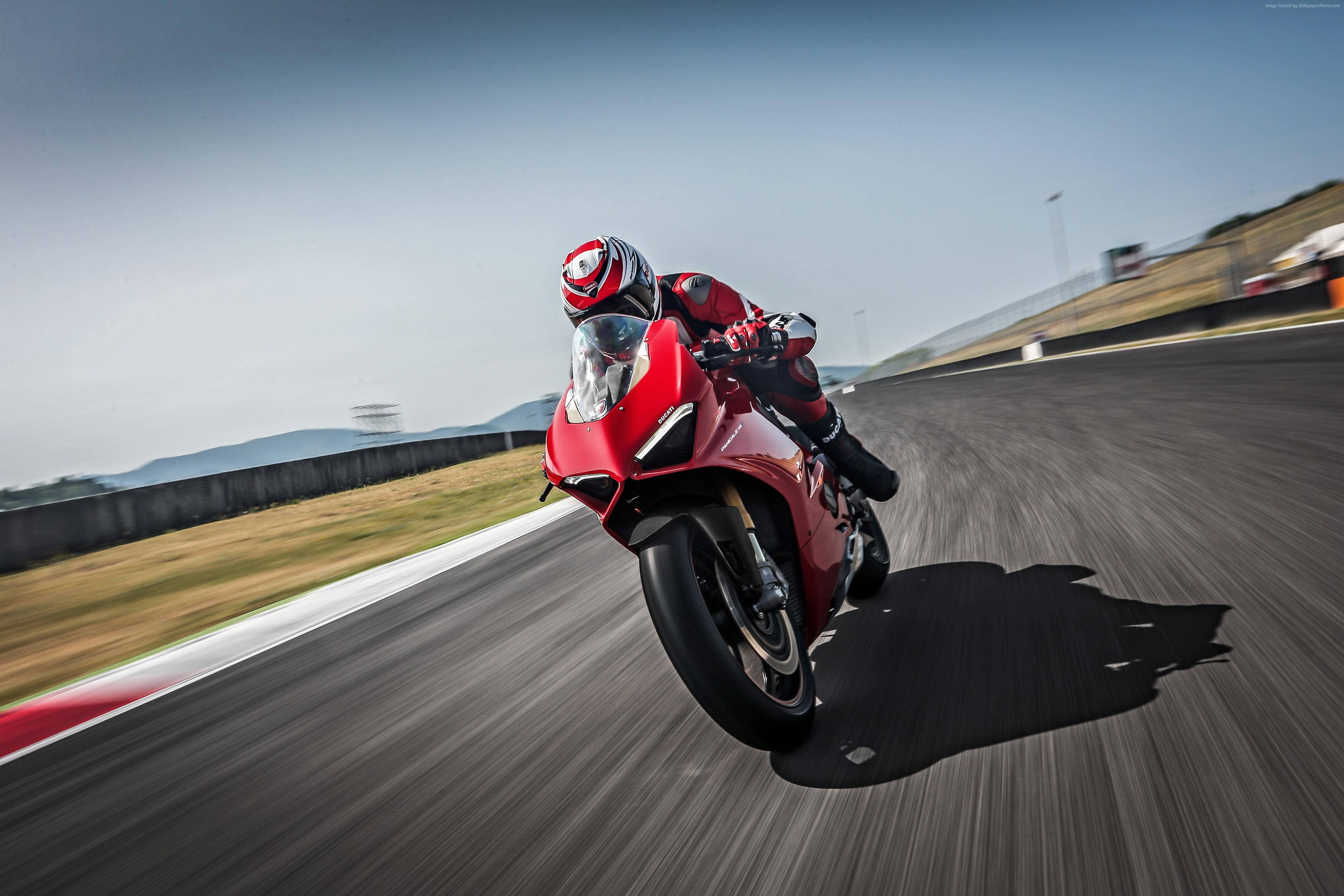red sport motorcycle, sunlit racetrack, rider, 4K Desktop Wallpaper