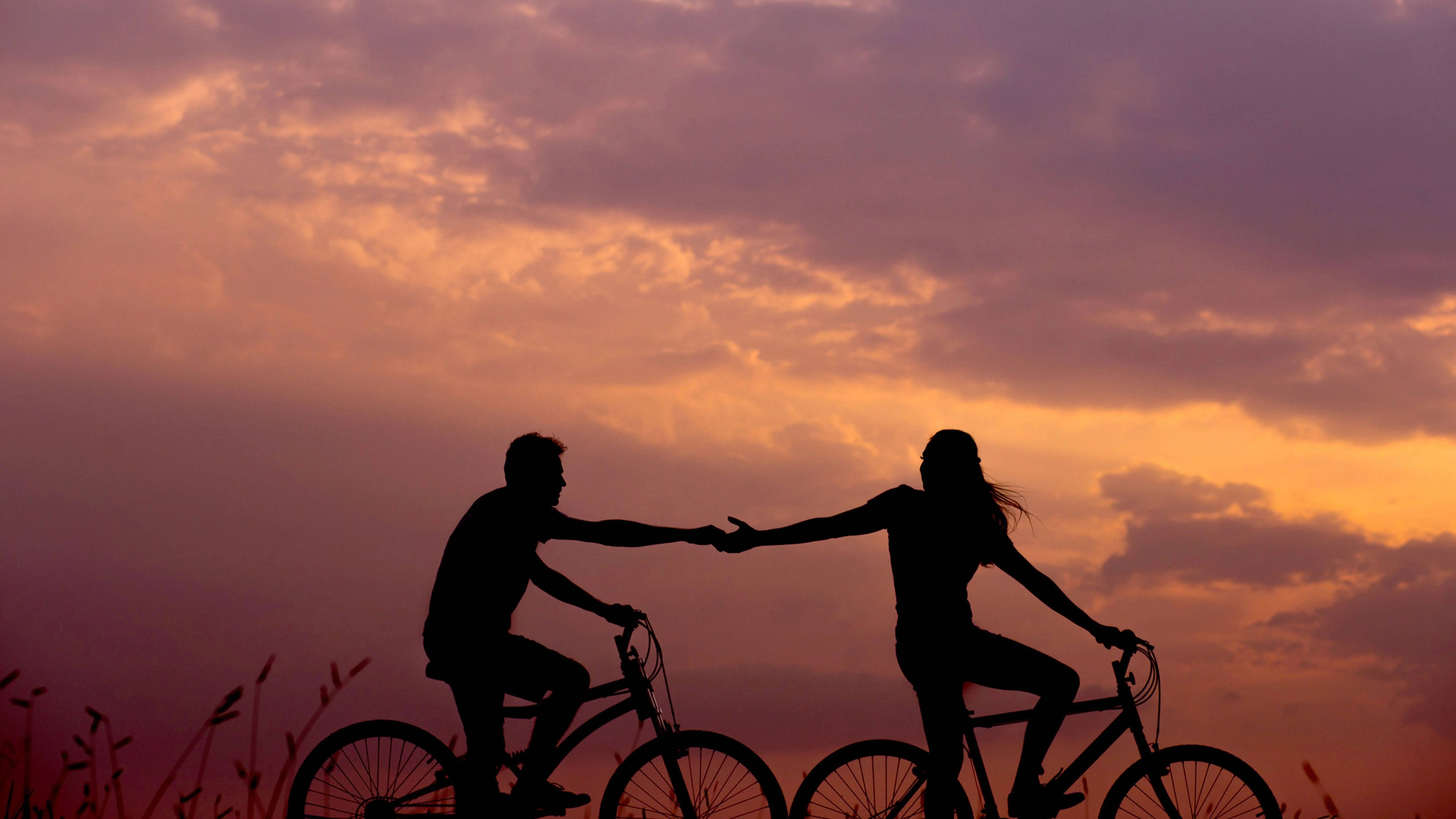 silhouette, two cyclists, shake hands, 5K Desktop Wallpaper