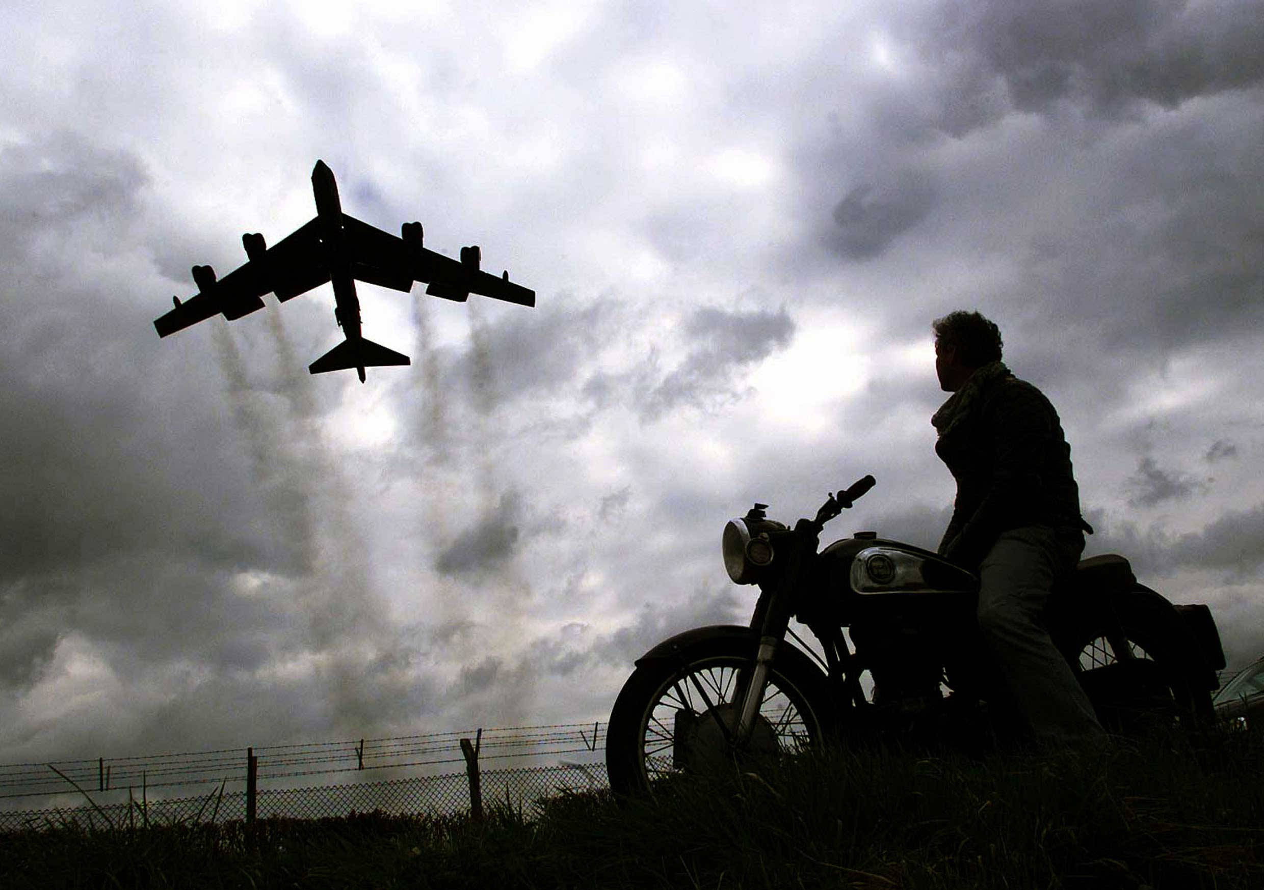 bomber plane, stormy sky, motorcyclist, Full HD Desktop Wallpaper