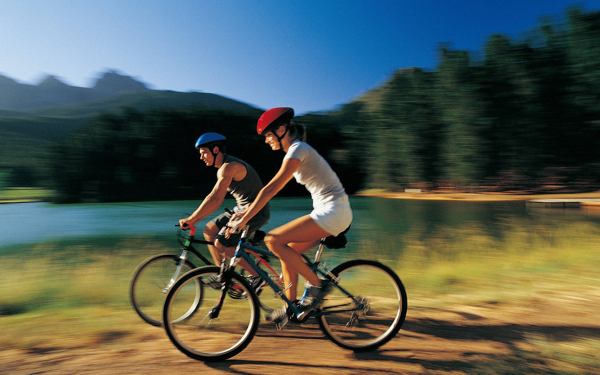 couple, bike ride, sunlit trail, Full HD Desktop Wallpaper