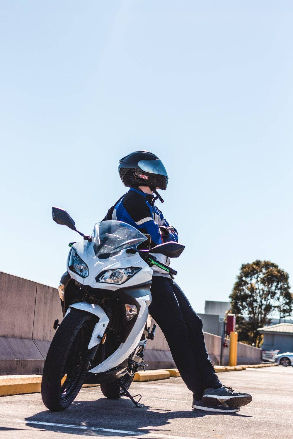 white sport bike, blue and black jacket, helmet, HD Phone Wallpaper
