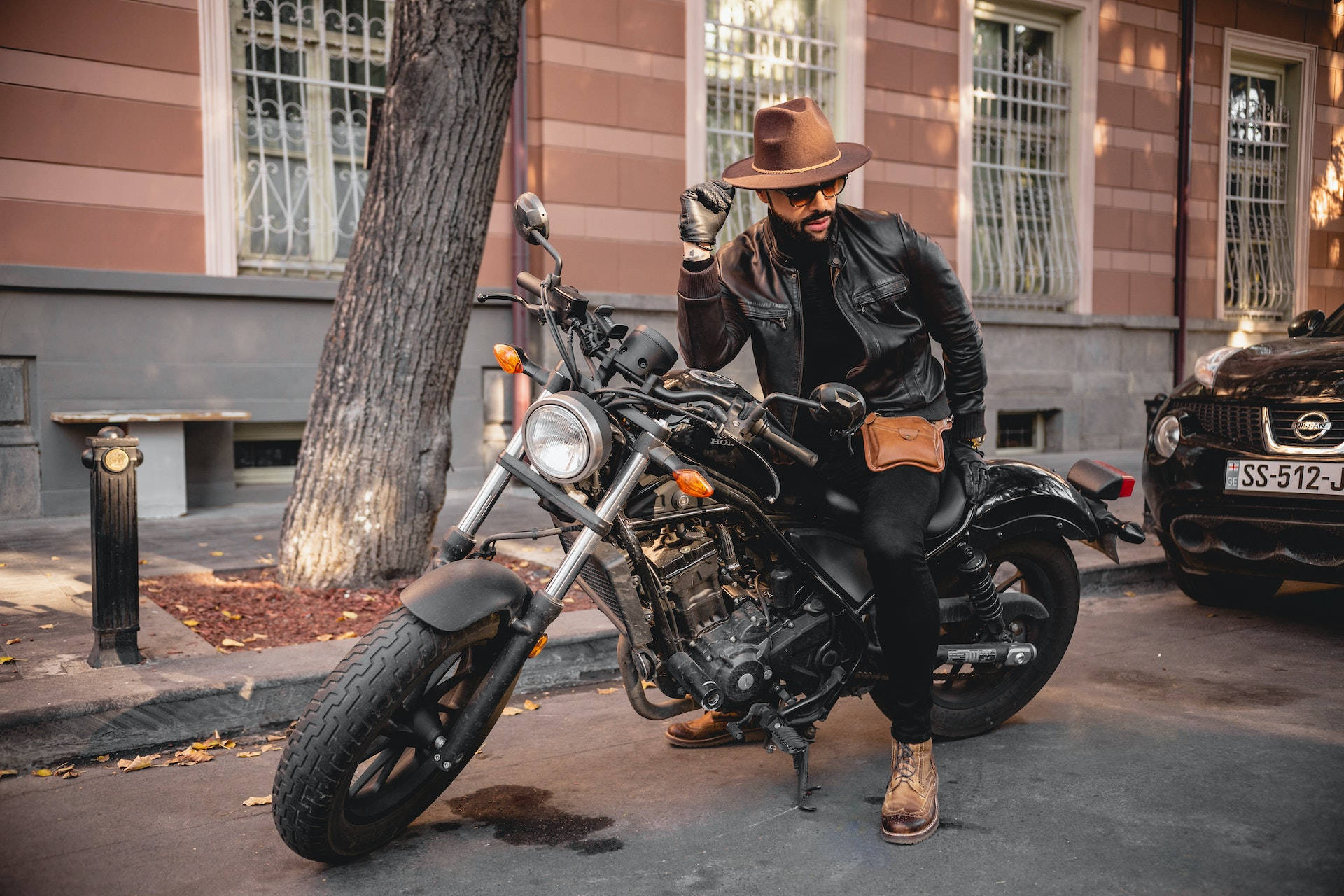 cowboy hat, black cruiser motorcycle, leather jacket, Full HD Desktop Wallpaper