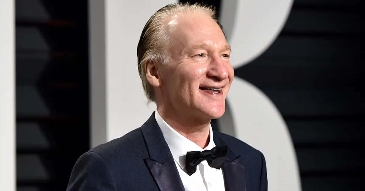 Bill Maher, dark suit, bow tie, SD Desktop Wallpaper