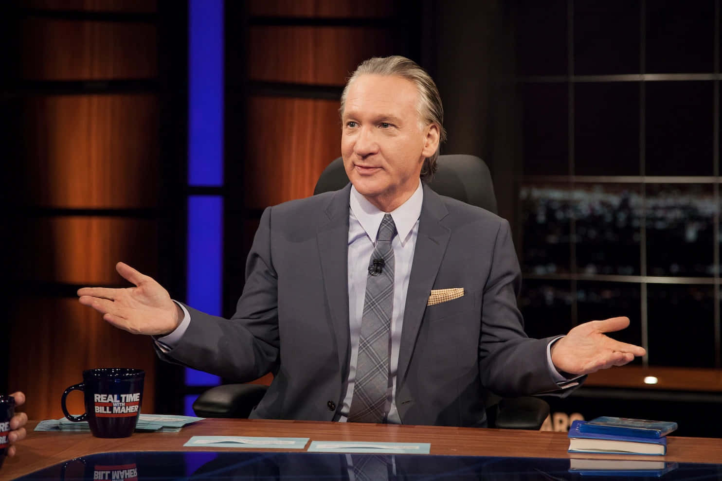 Bill Maher, gray suit, desk, HD Desktop Wallpaper