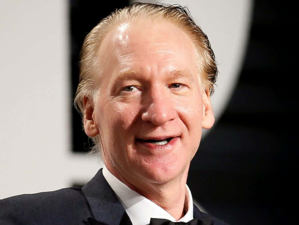 Bill Maher, blond hair, black tuxedo, SD Desktop Wallpaper
