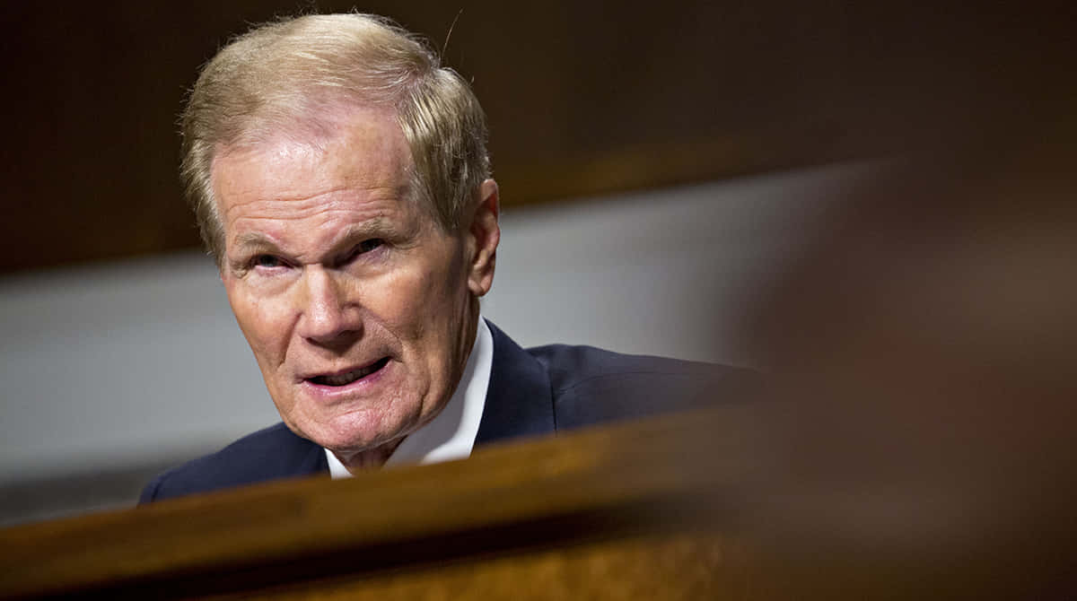 Bill Nelson, suit, wooden barrier, SD Desktop Wallpaper