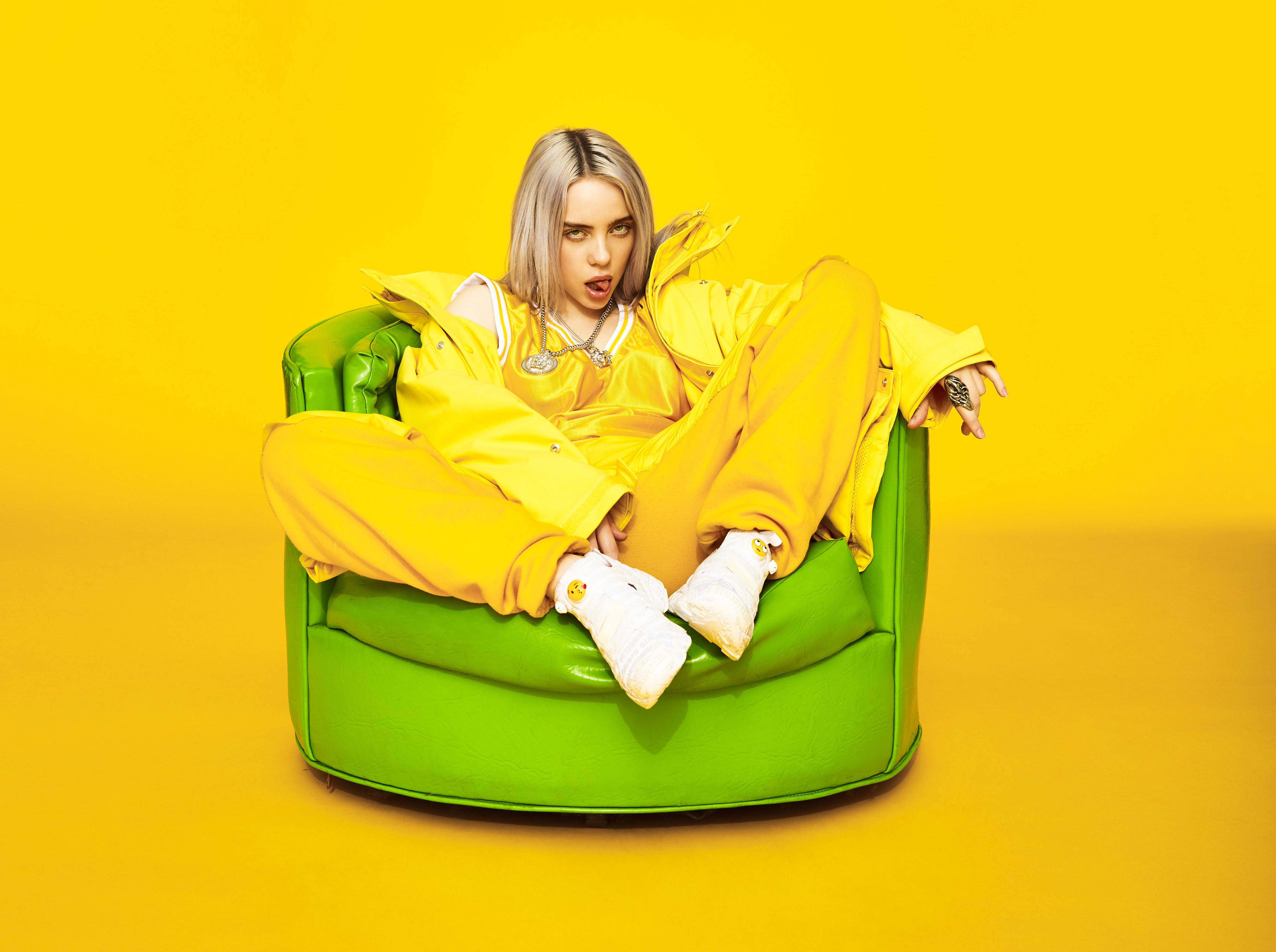 Billie Eilish 4K, lime green chair, yellow outfit, 4K Desktop Wallpaper