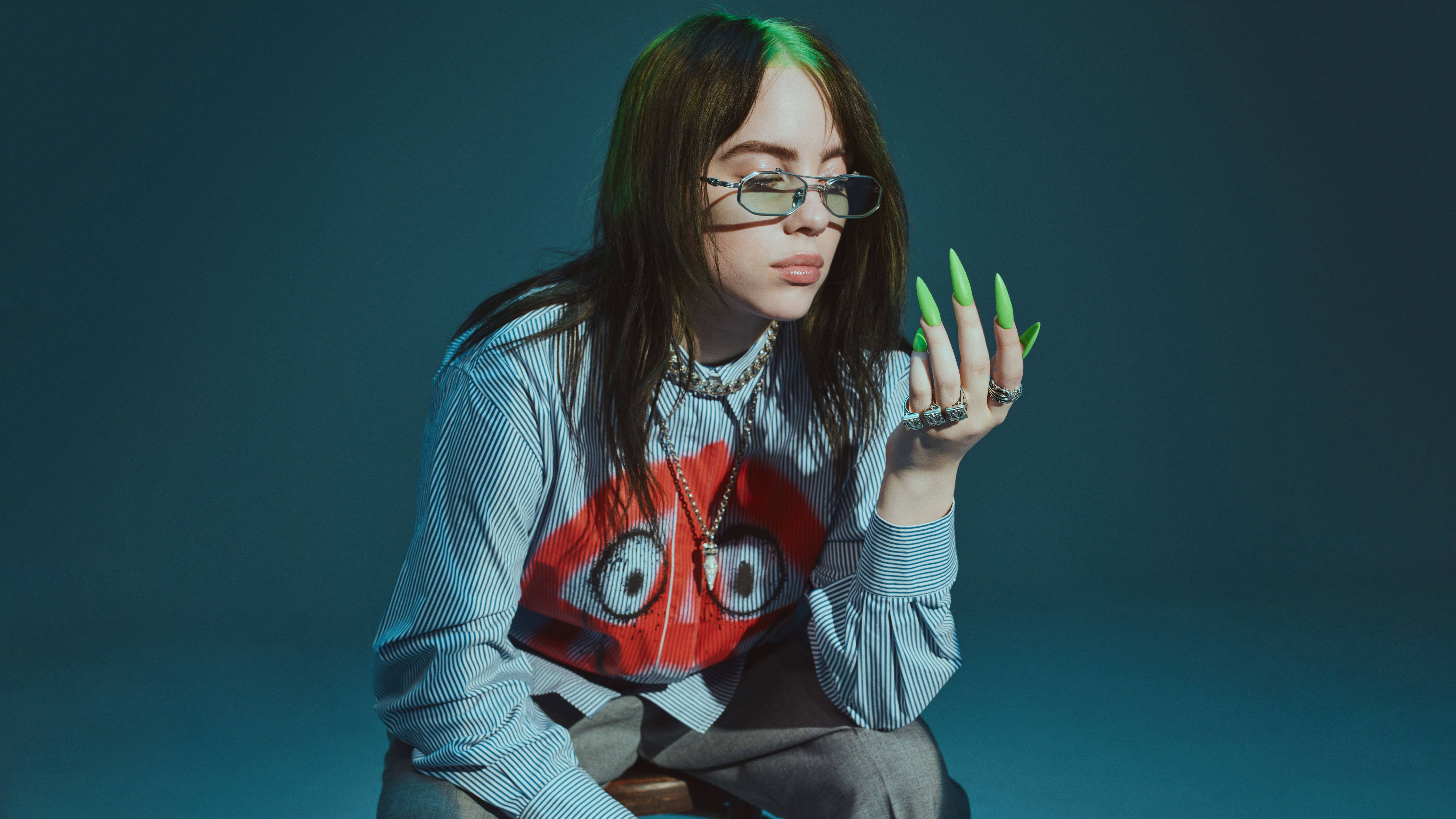 Billie Eilish, neon green nails, teal backdrop, 5K Desktop Wallpaper