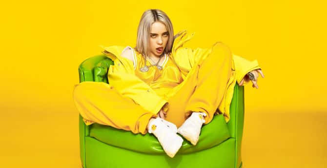 Billie Eilish, laptop, green armchair, SD Desktop Wallpaper