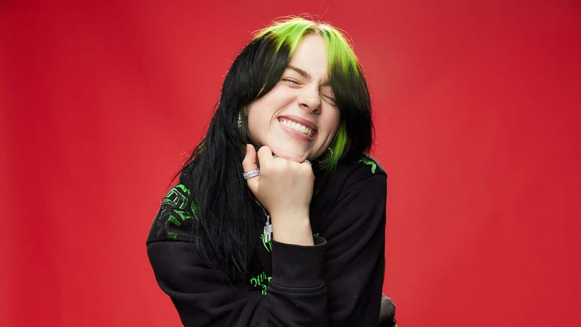 Billie Eilish, black and neon green hair, vivid red background, Full HD Desktop Wallpaper