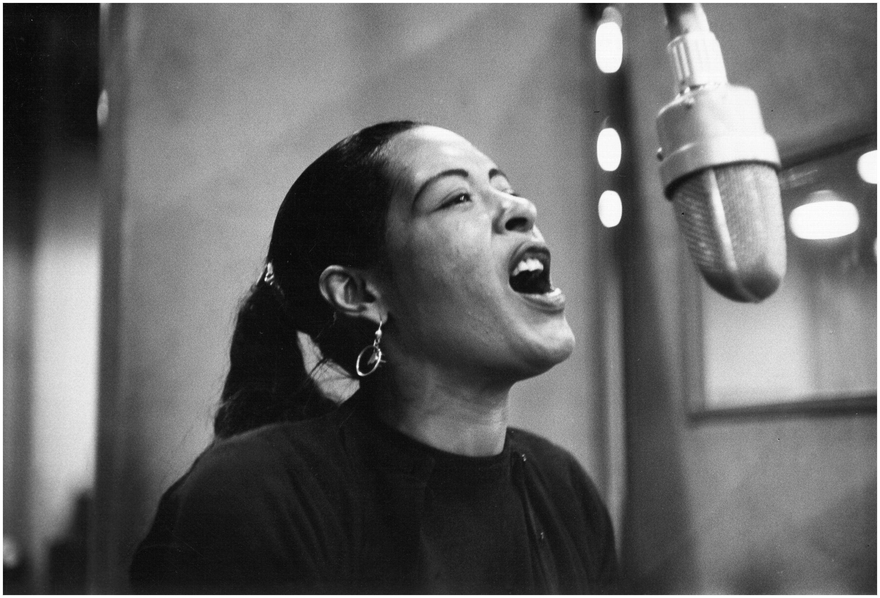 Billie Holiday, vintage microphone, dimly lit studio, 2K Desktop Wallpaper