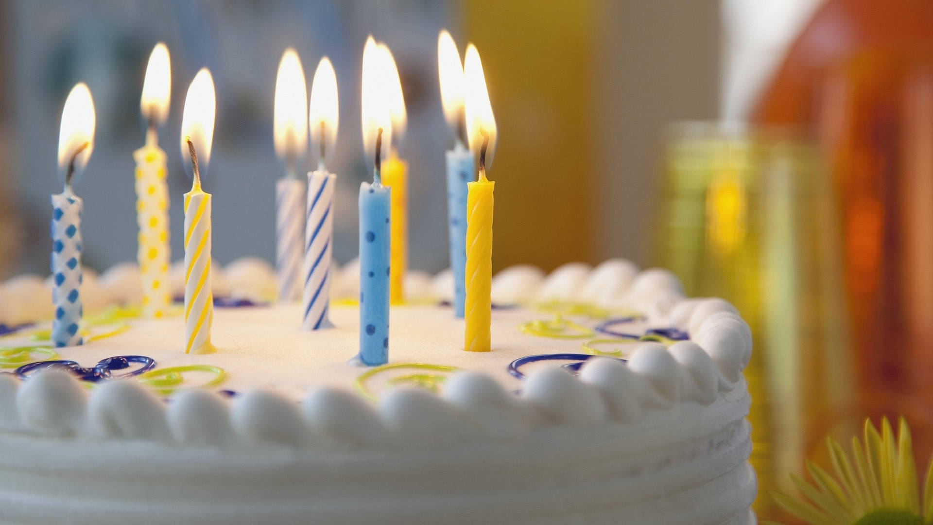 blue yellow birthday cake candles, white frosted birthday cake, lit blue yellow and striped candles, Full HD Desktop Wallpaper